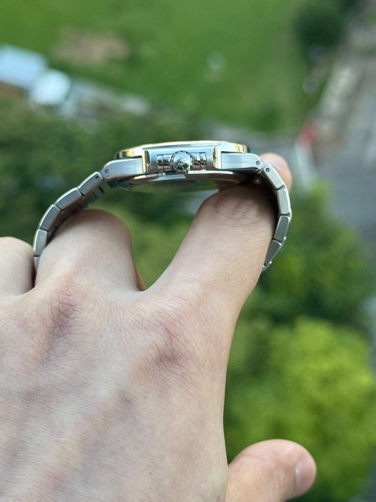 May be an image of ring and wrist watch