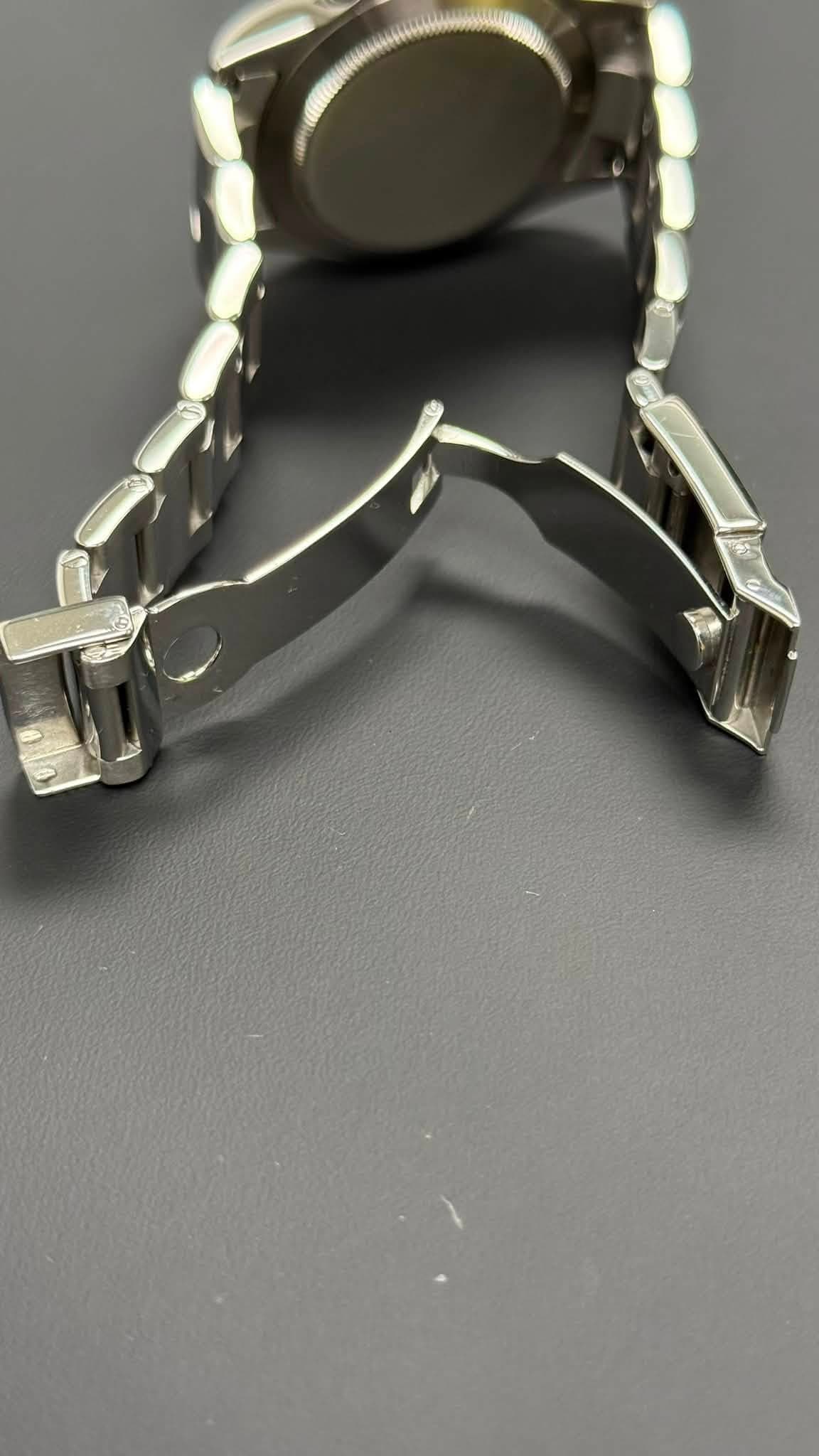 May be an image of wrist watch