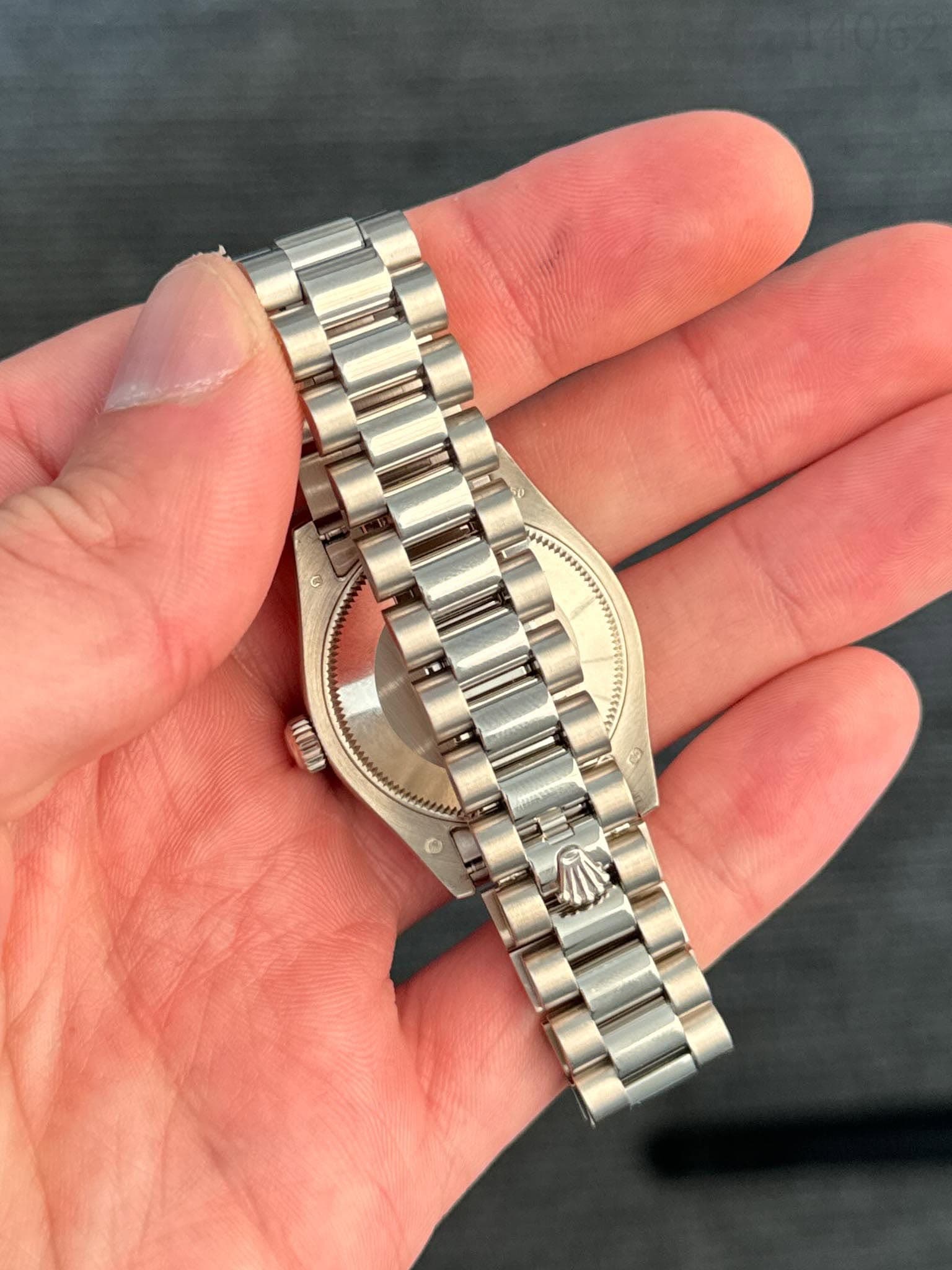 May be an image of wrist watch