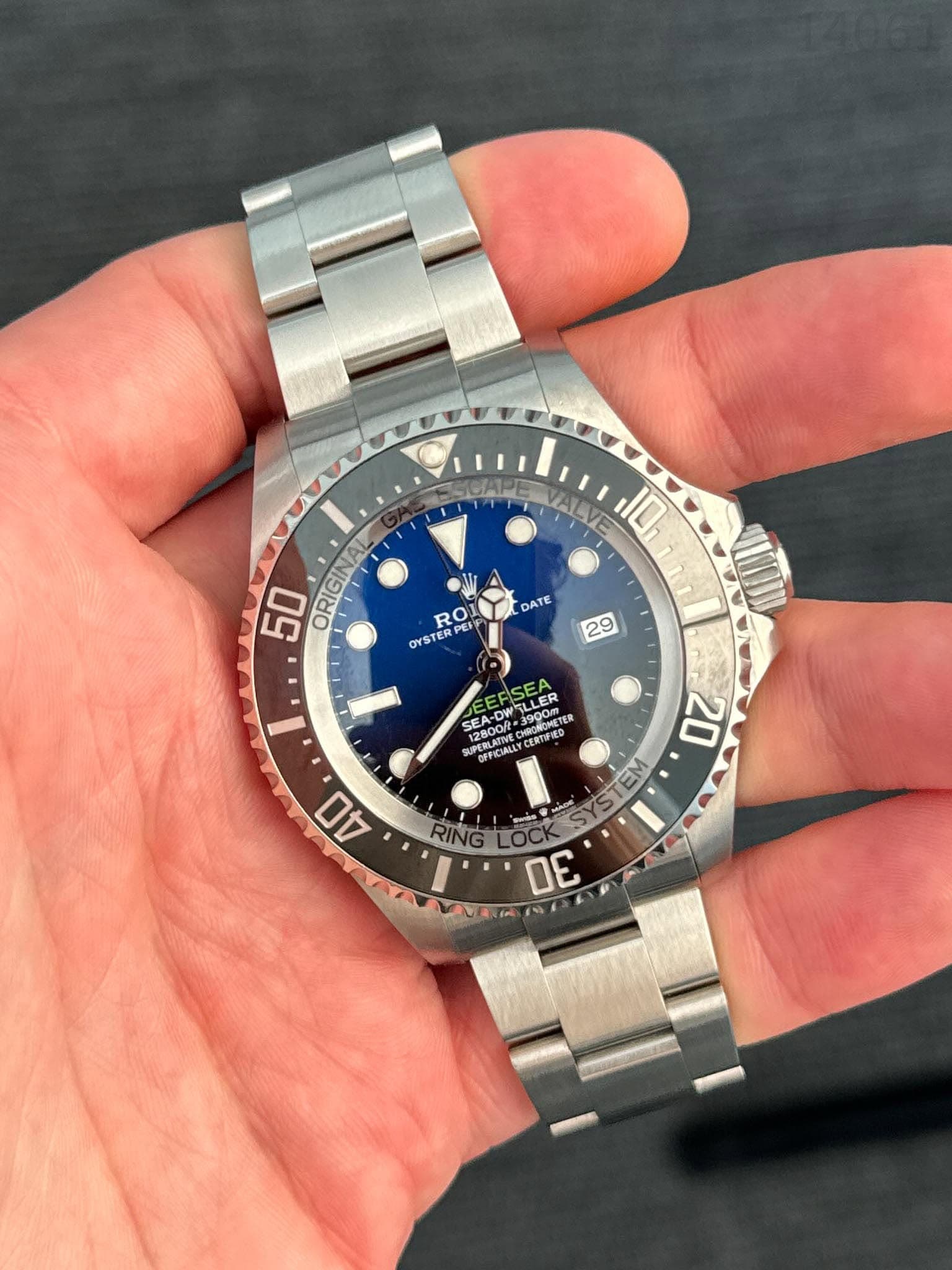 May be an image of wrist watch and text
