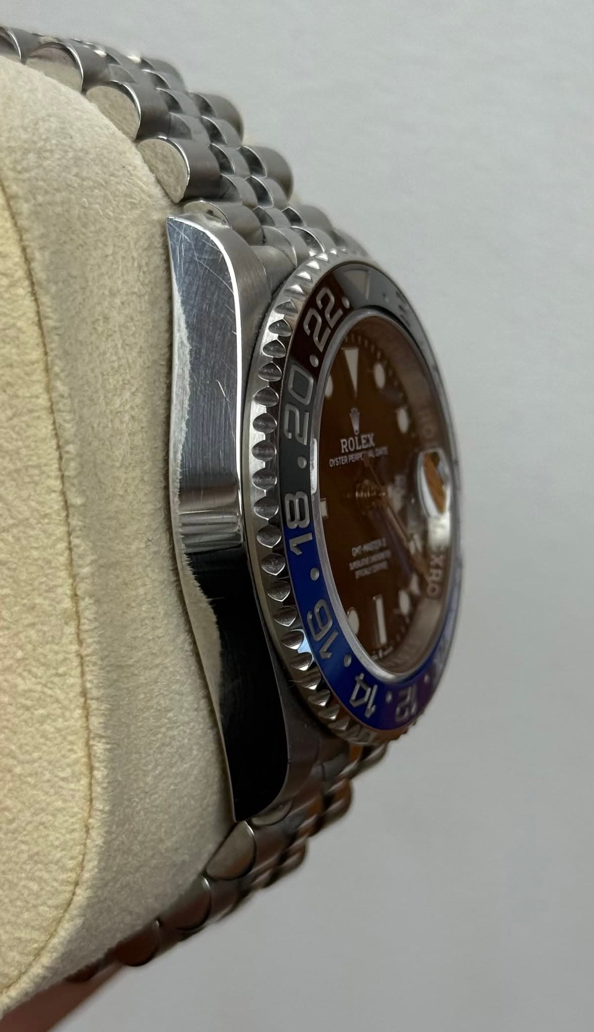 May be an image of wrist watch and text