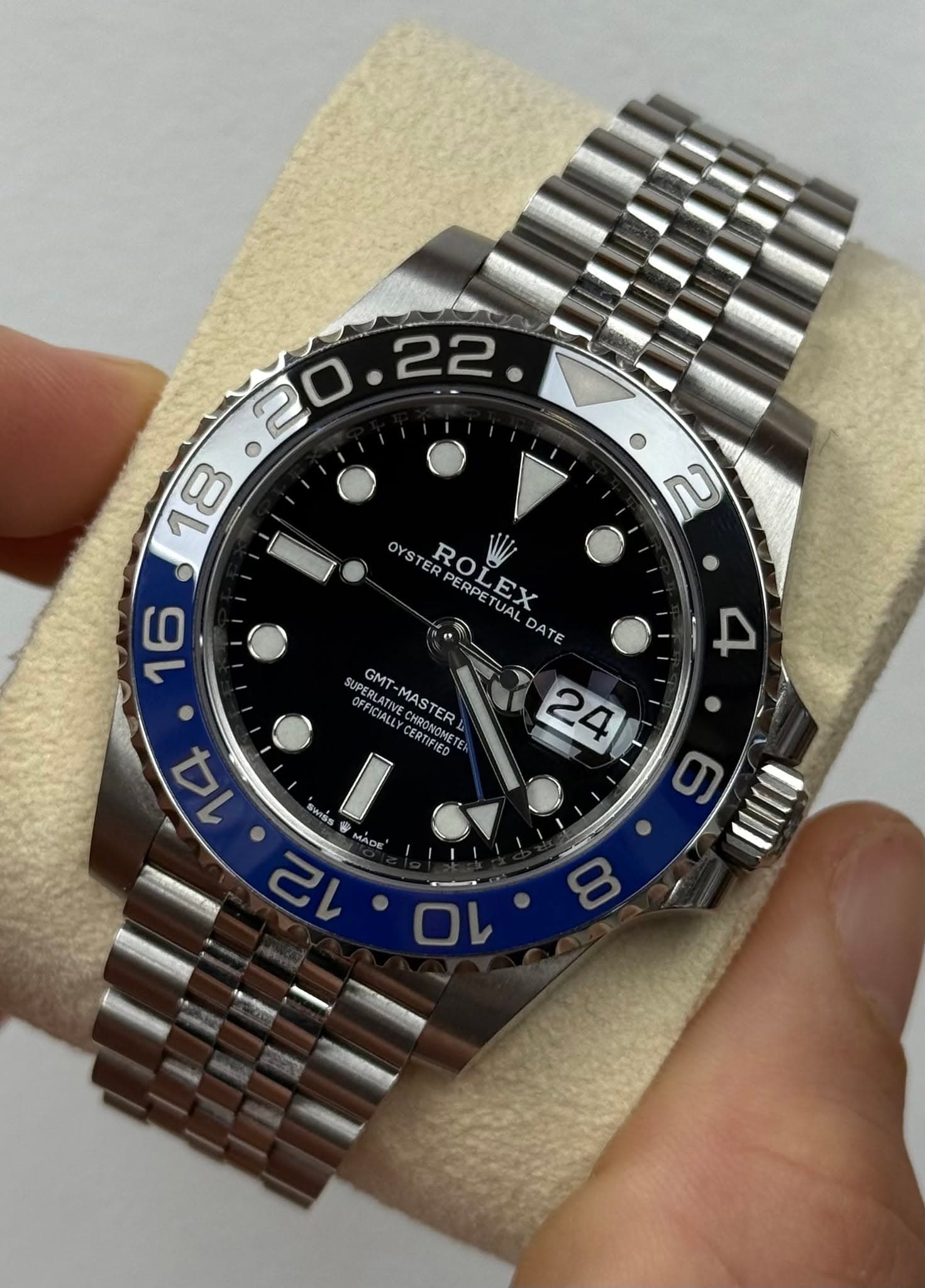 May be an image of wrist watch and text