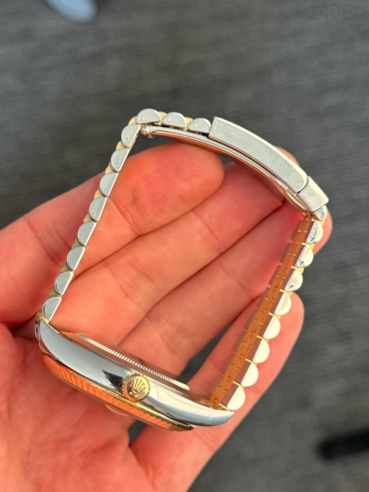 May be an image of wrist watch