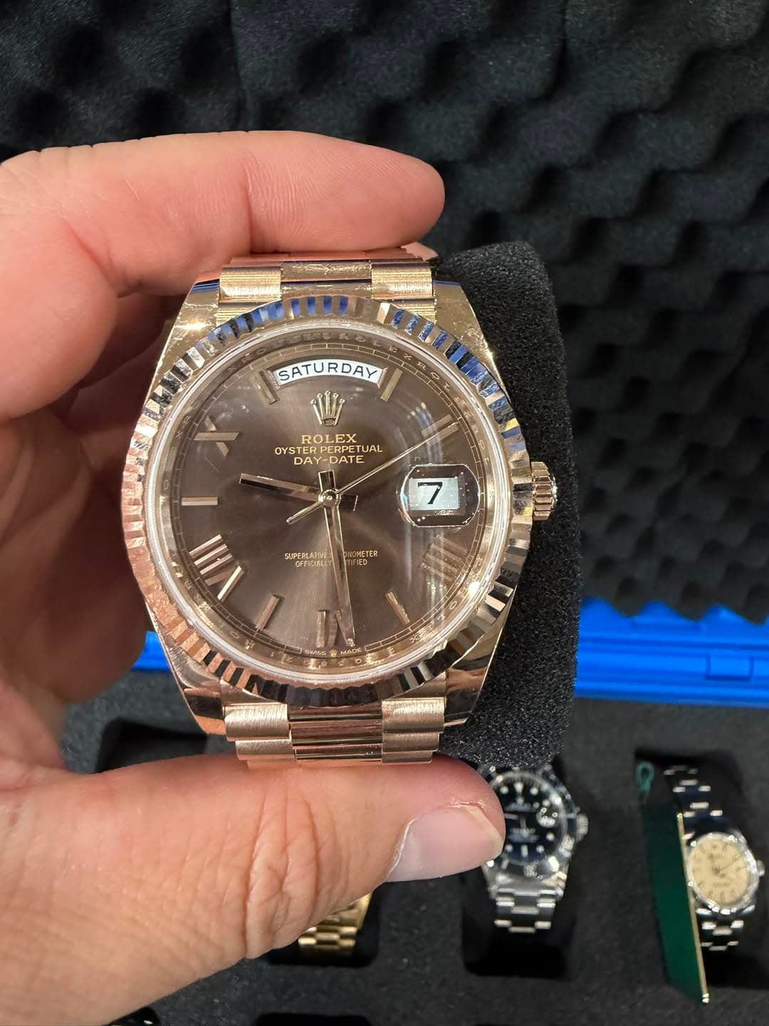 May be an image of wrist watch and text