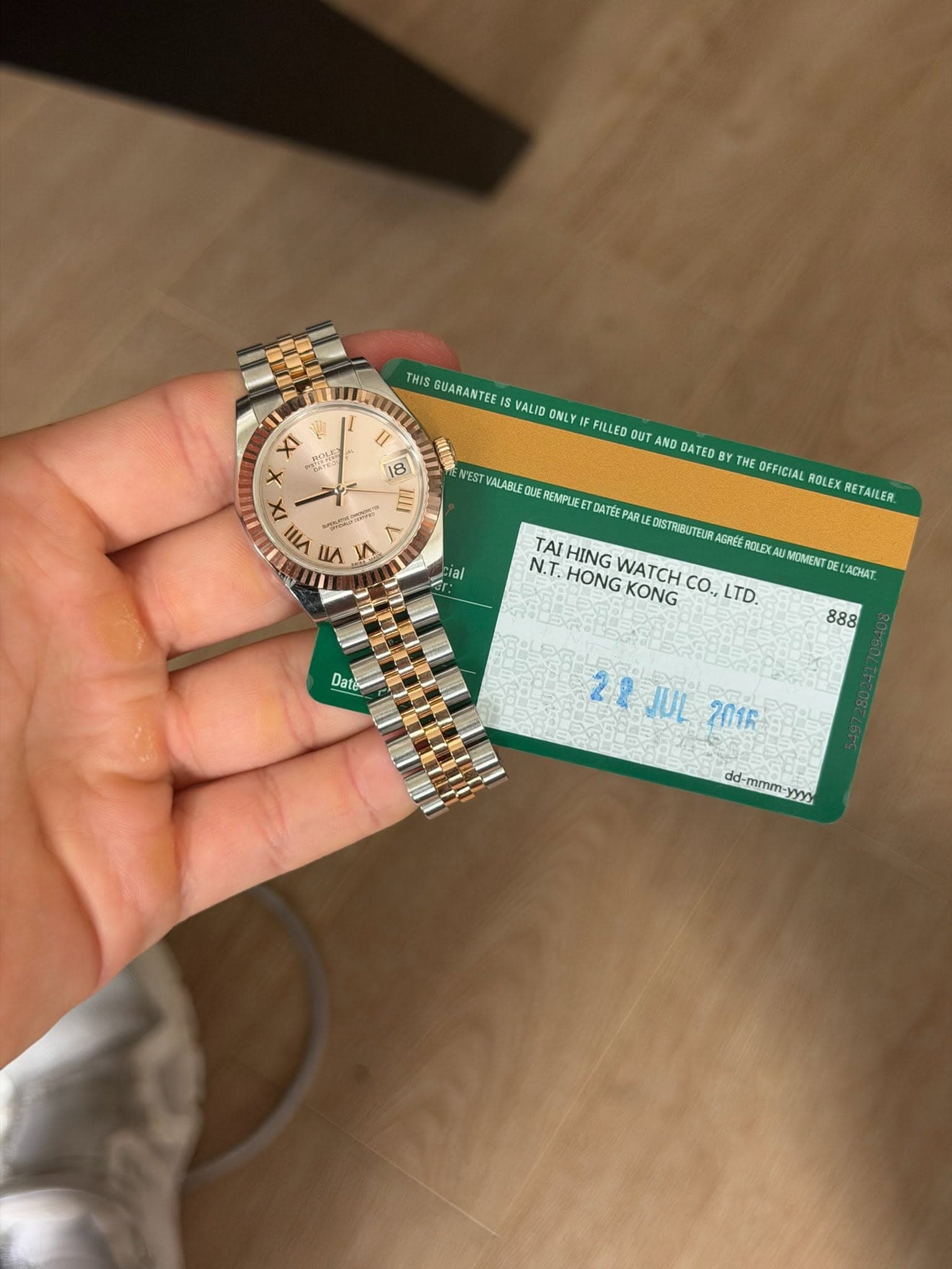 May be an image of wrist watch, money and text that says 'X 0า X IX VIII S D 8 ミ く THIS GUARANTEE VALID ONLY FILLED OUT AND DATED THE OFFICIAL ROLEX RETAILER. ial NEST VALABLE UE…