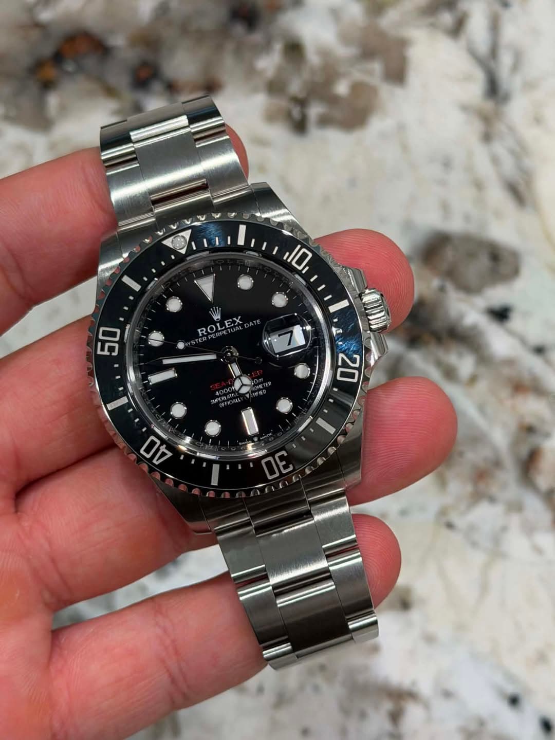 May be an image of wrist watch and text that says '10 ROLEX cTc ROL 50 20 20 台0'