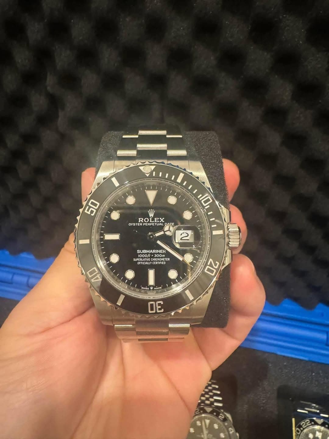 May be an image of wrist watch and text