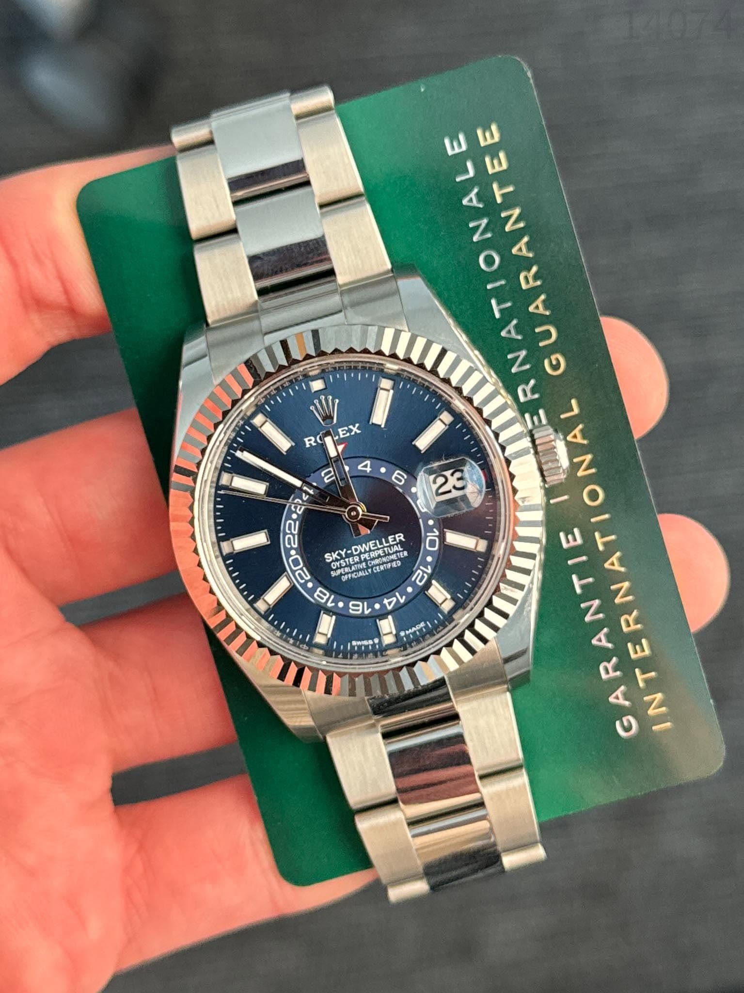 May be an image of wrist watch and text
