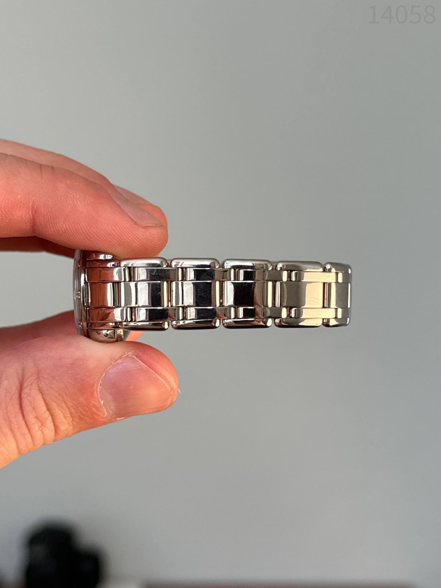 May be an image of jewelry and wrist watch