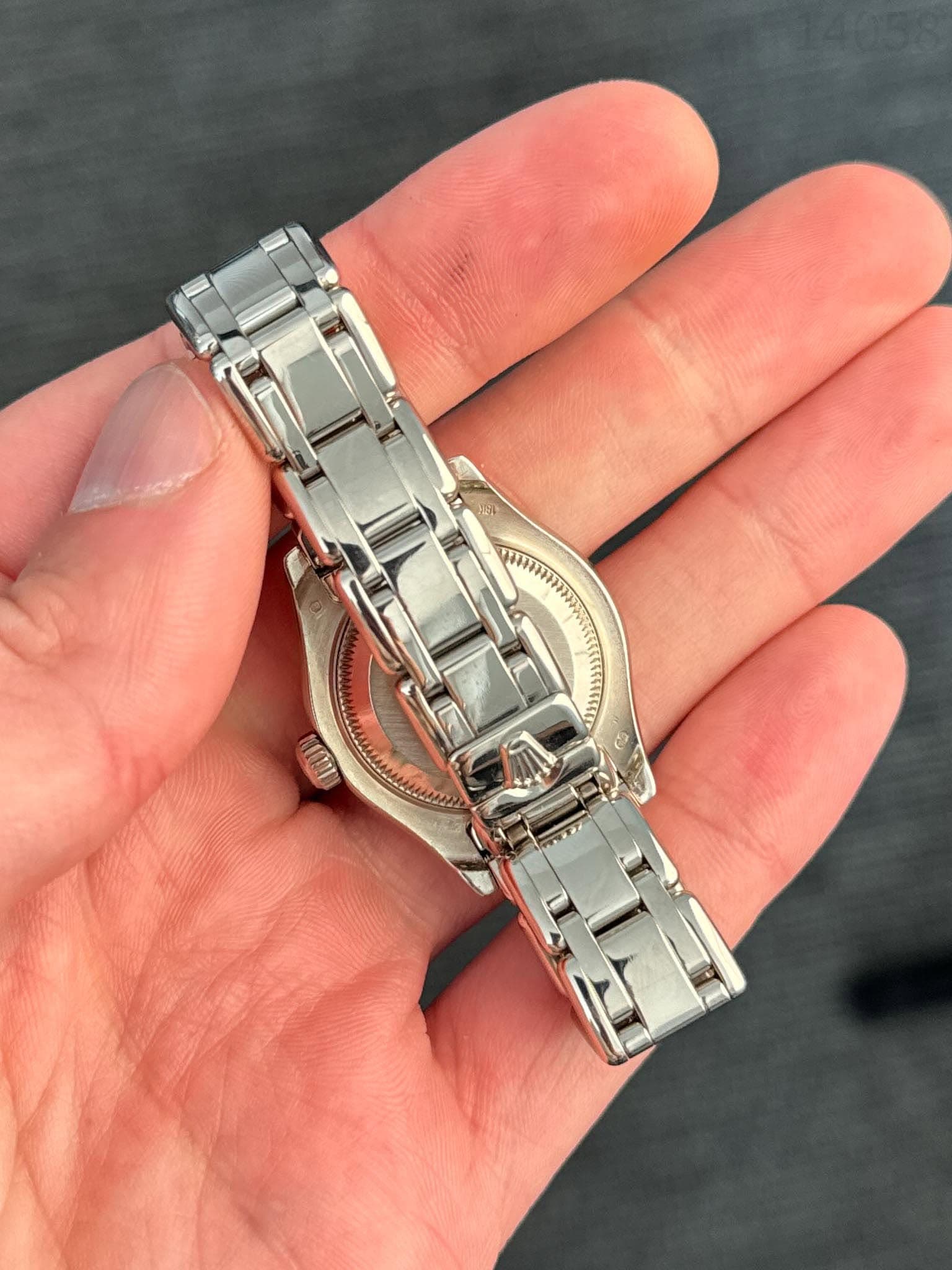 May be an image of wrist watch