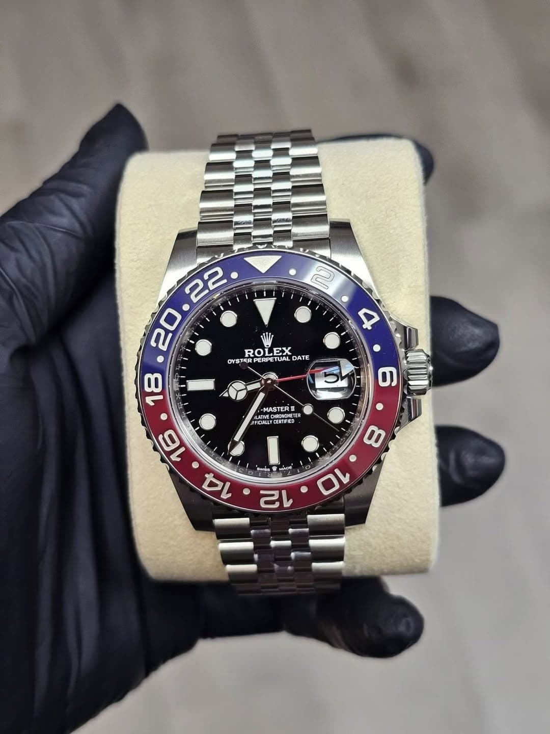 May be an image of wrist watch and text