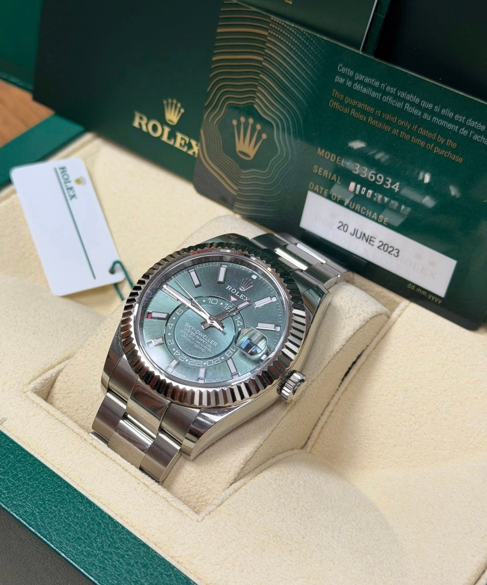 May be an image of wrist watch and text that says 'ROLEX ROLEX ROLE N .口年 FURCHASE 20 JUNE 2023 RO ၁ .10 6 / 14 OSELLER C 18 4 III 02 G'