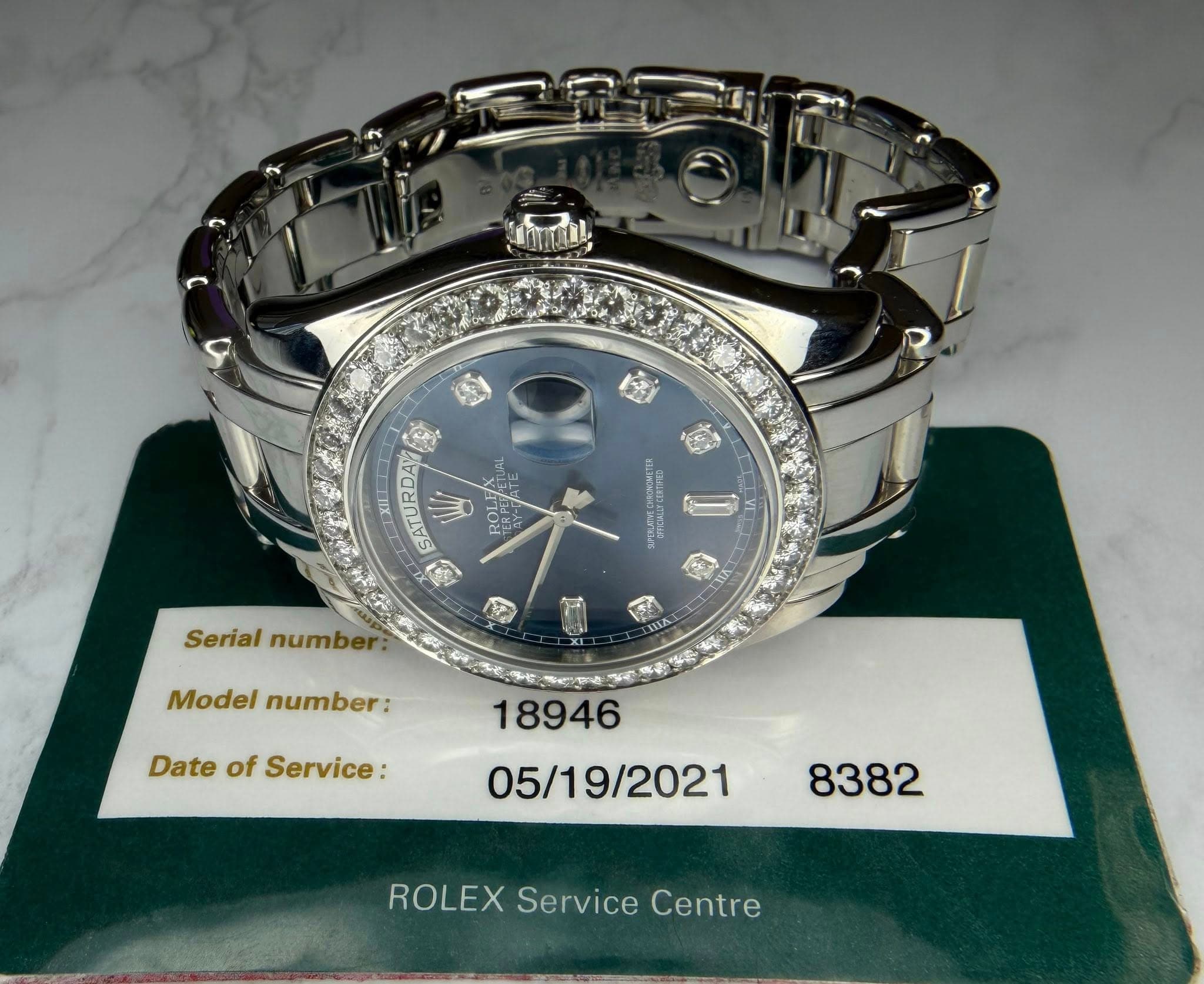 May be an image of wrist watch and text that says '不需场 V ROPE COTMU BPEHATE VE Serial number Model number: Date DateofService: of Service: 18946 05/19/ ROLEX Service Centre'