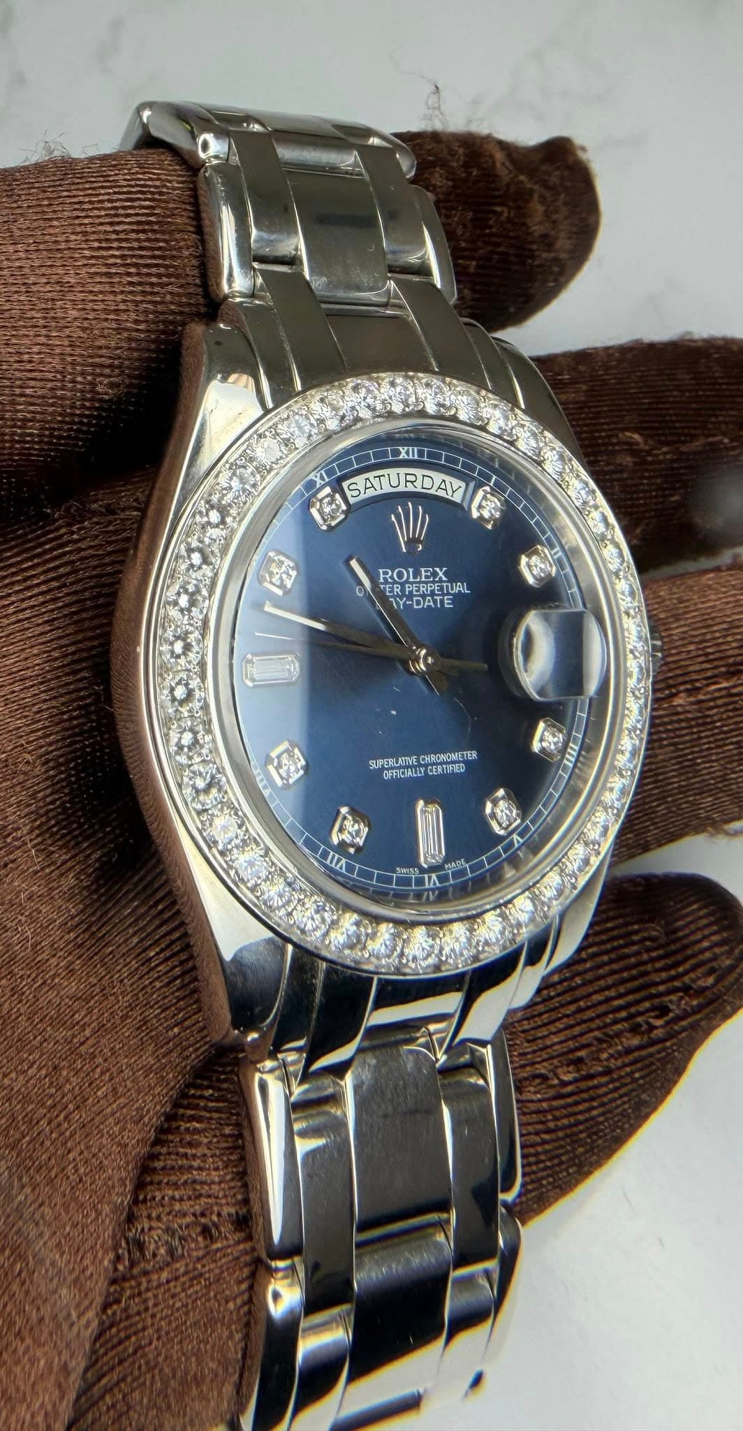 May be an image of wrist watch and text