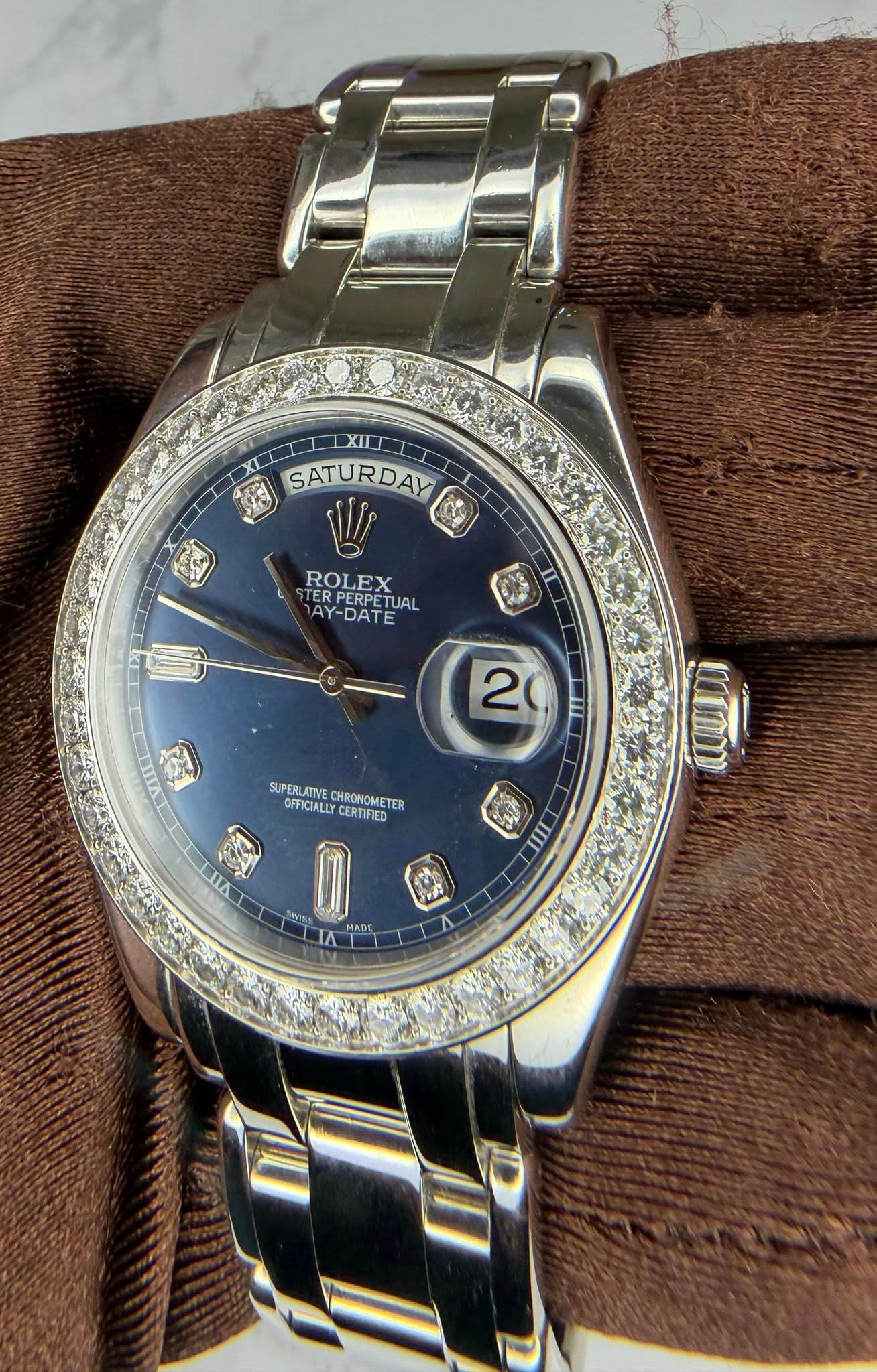 May be an image of wrist watch and text that says 'XII XI XILID RDAY SATURDAY III バ ROLEX RPERPE PERPETUAL TARPERPETUAL ERPERPET ER AY-DATE 2 III IA ر SUPERLATIVE CHRONOMETER…
