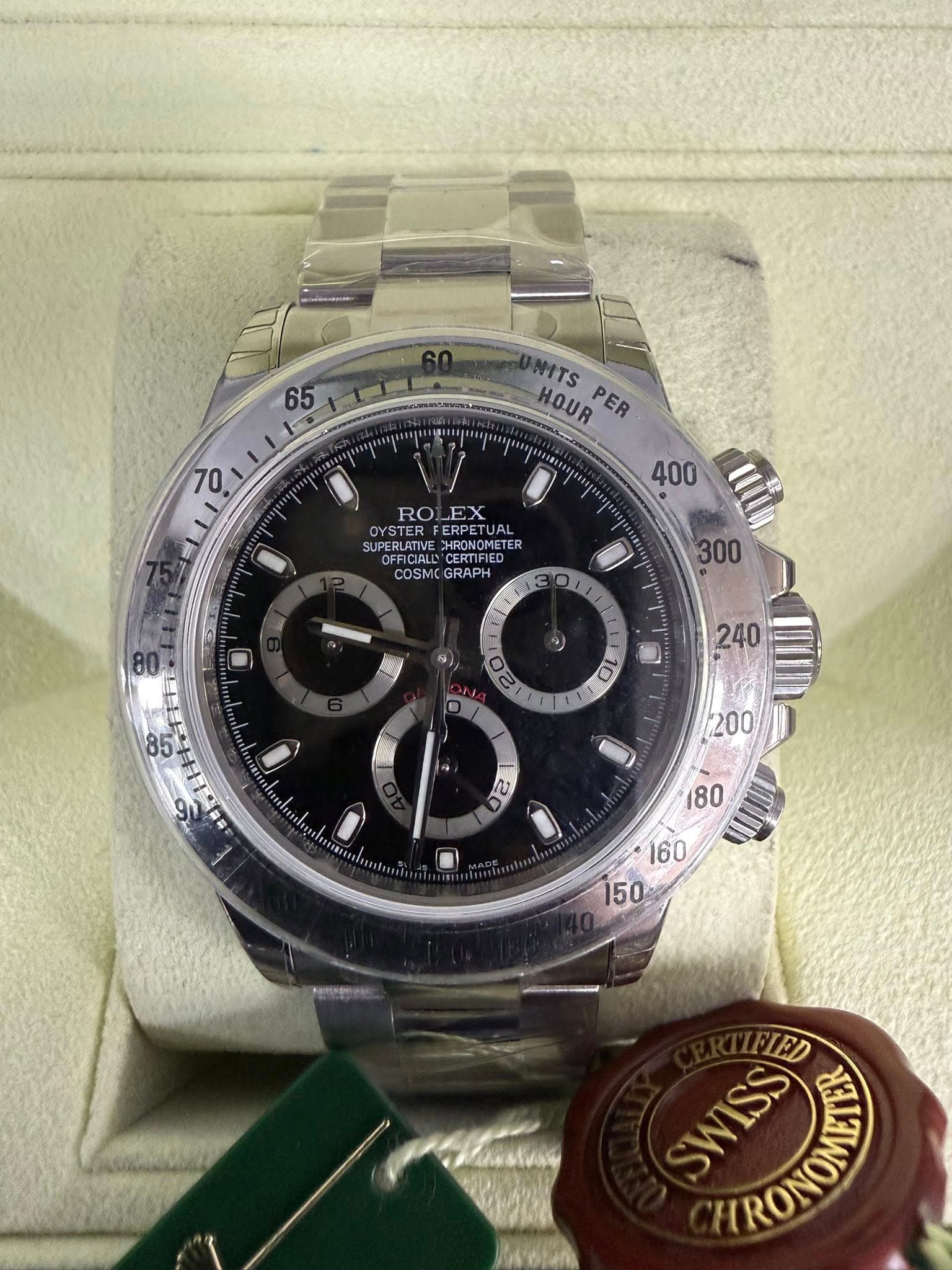 May be an image of wrist watch and text