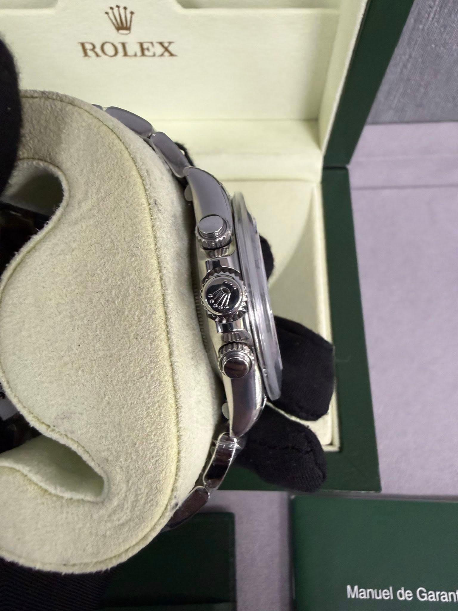 May be an image of wrist watch and text that says 'ROLEX Manuel de Garan'