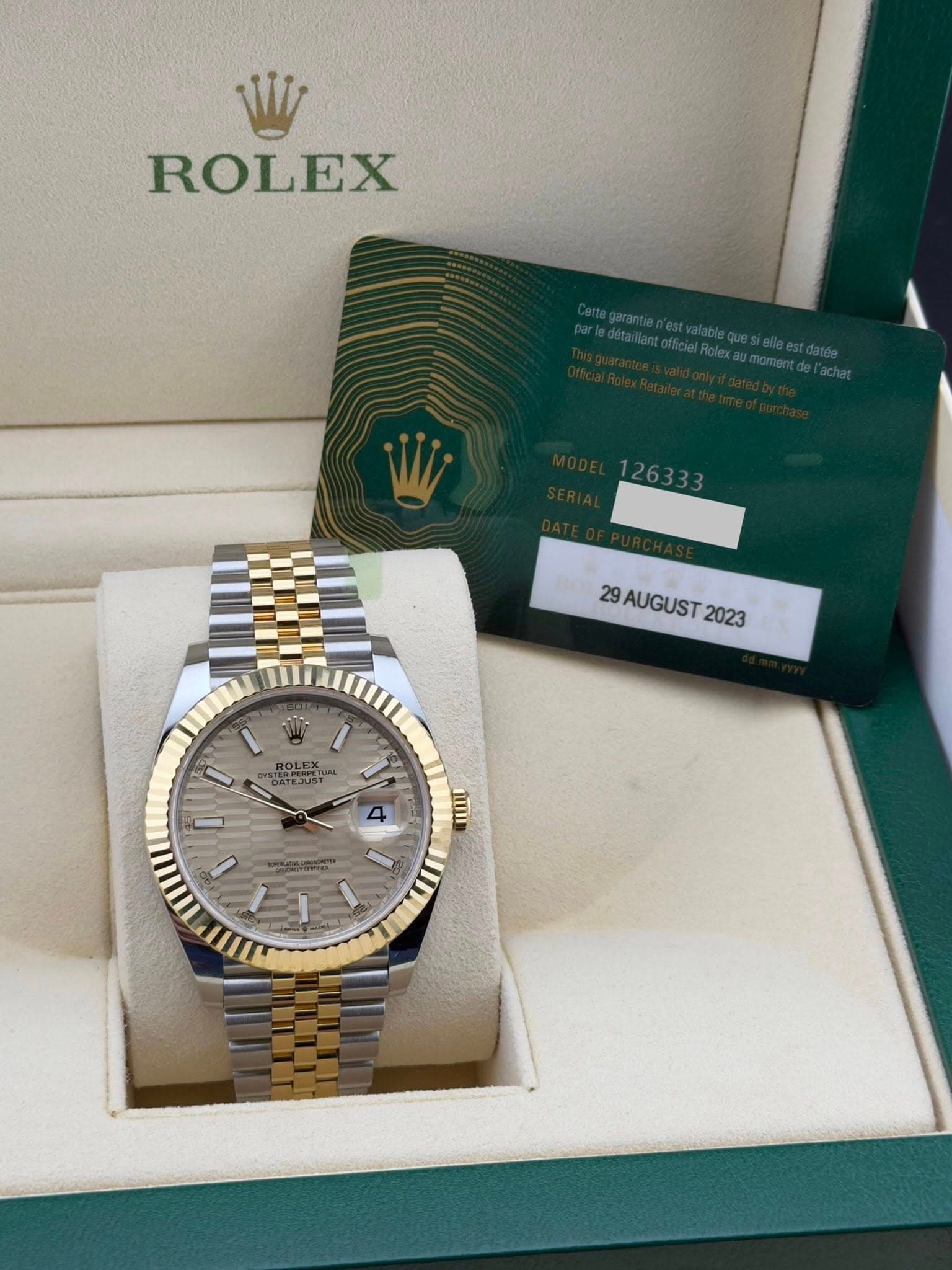 May be an image of wrist watch and text that says 'ROLEX 29AUGUST 29AUGUST2023 2023 ROLEXTUR DATEJUST 精 4 0 ।'