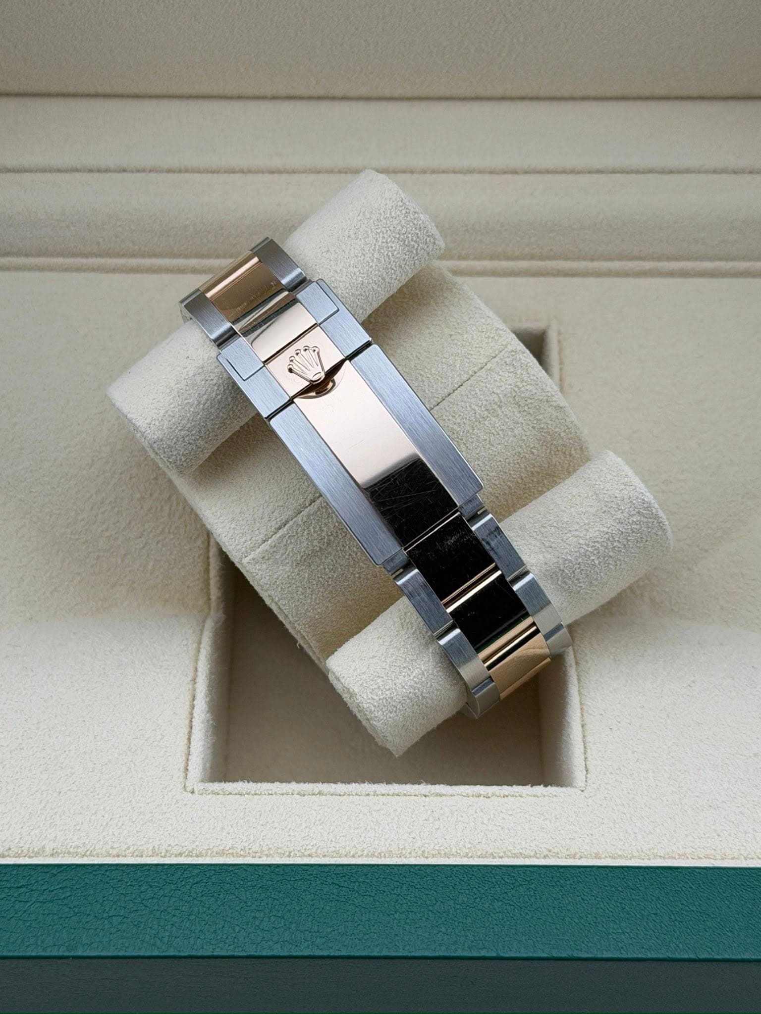 May be an image of wrist watch and jewelry