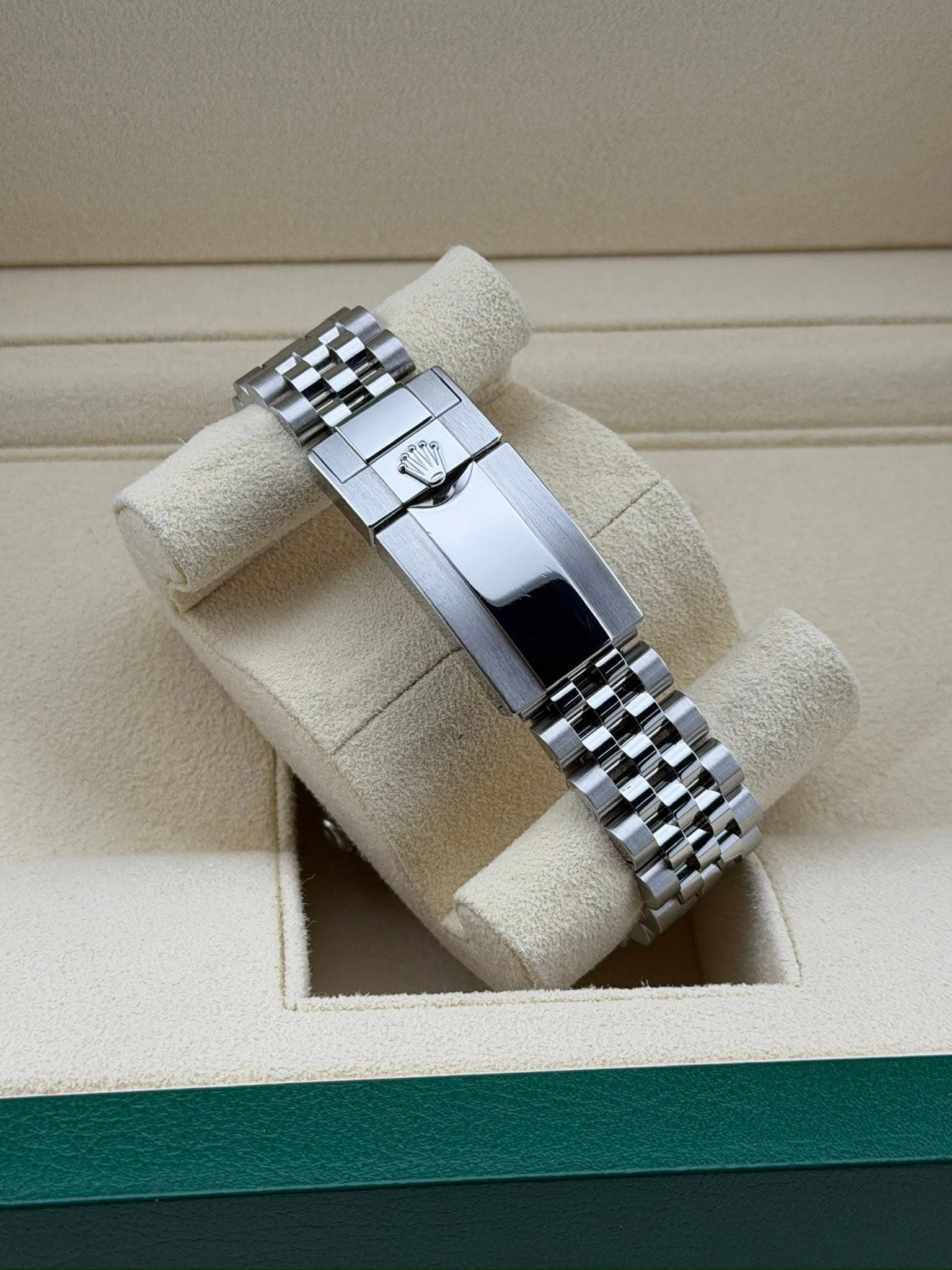 May be an image of wrist watch and jewelry