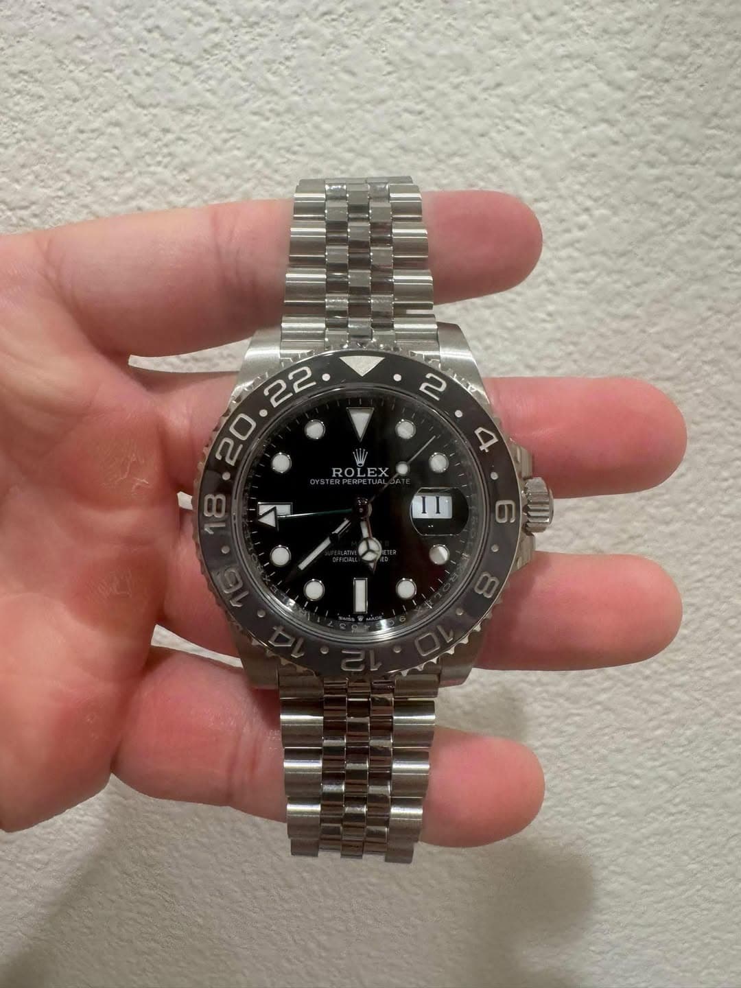 May be an image of wrist watch and text that says '• U 17 ኢትዮያ ROLEX PERFETUA ROL II'