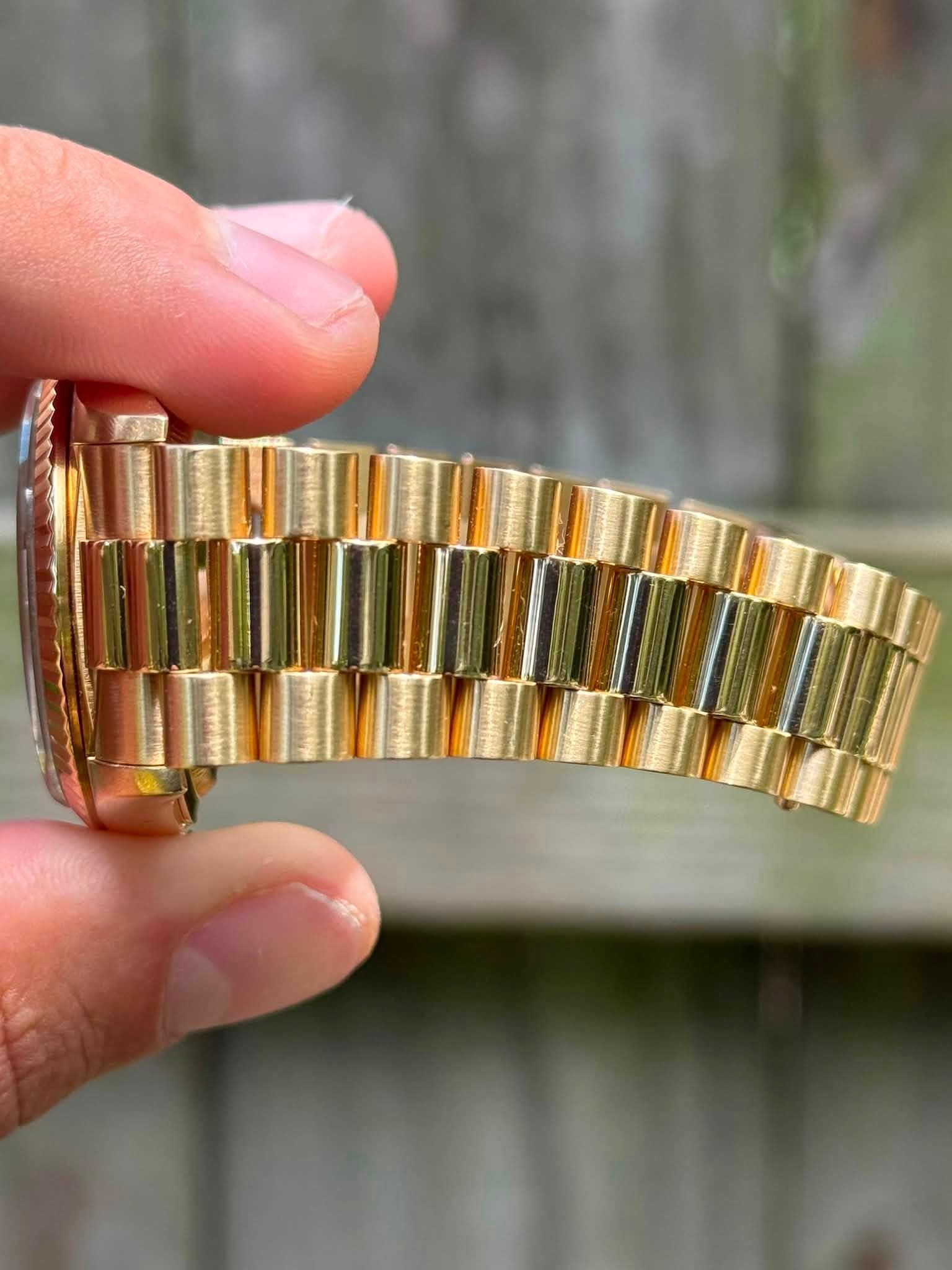May be an image of wrist watch
