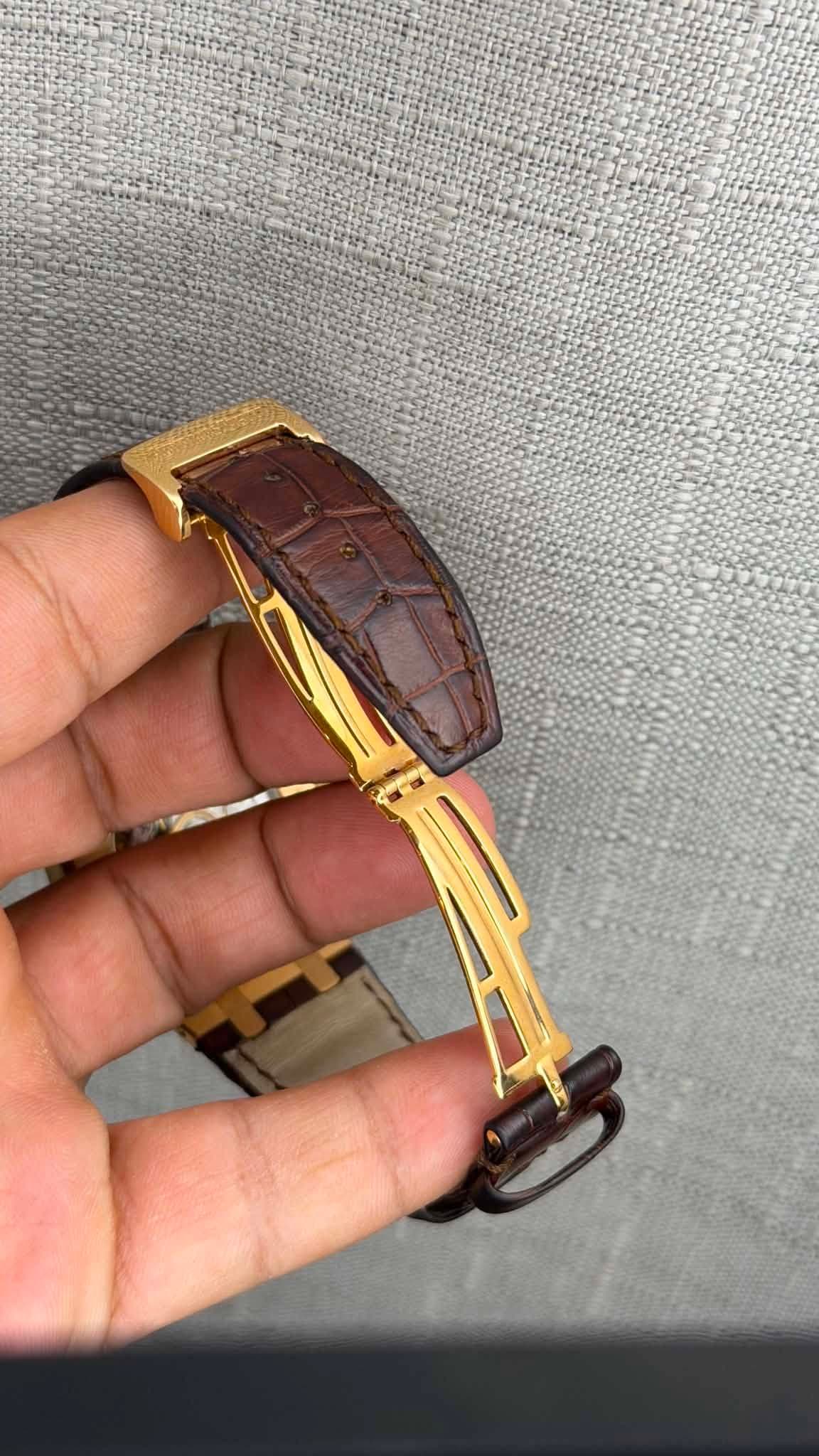 May be an image of wrist watch