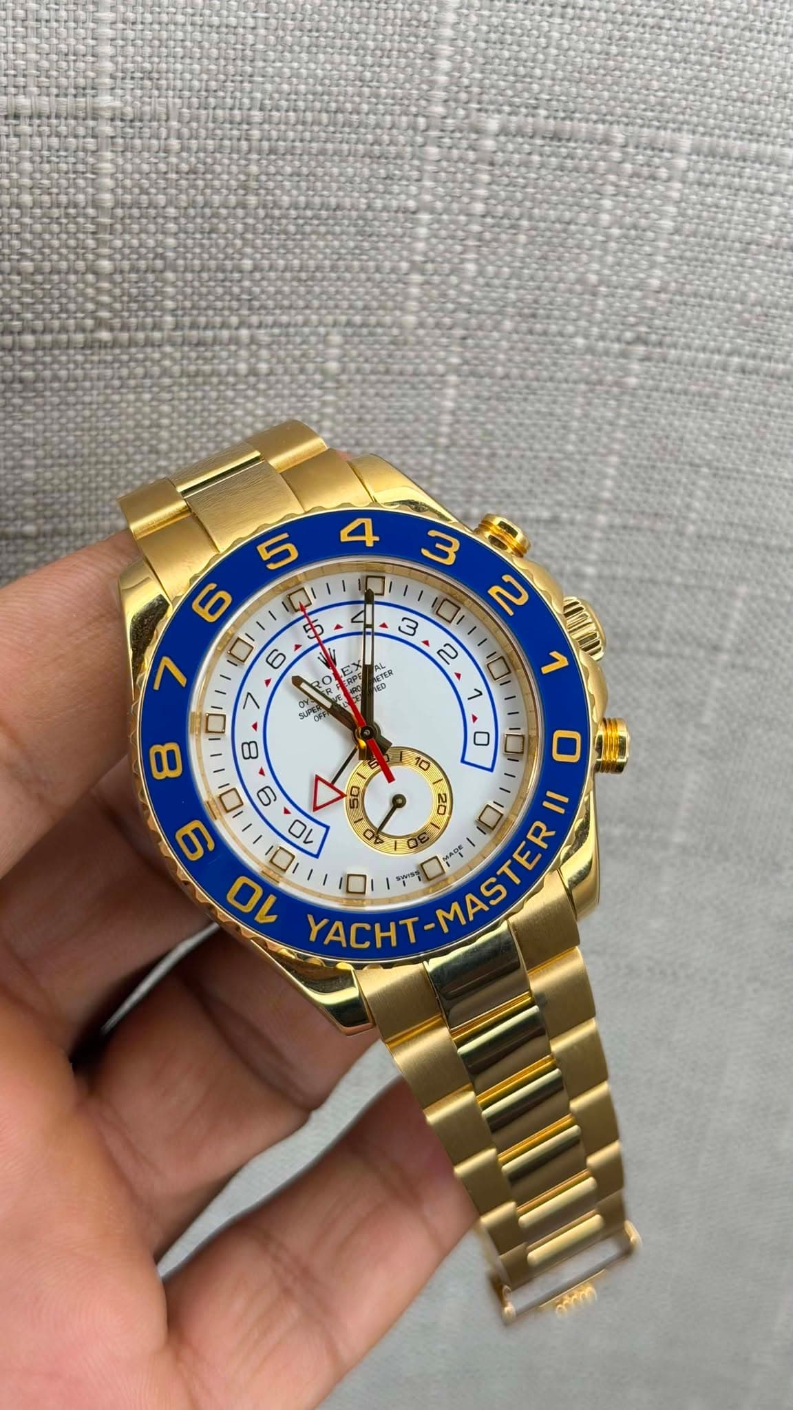 May be an image of wrist watch and text