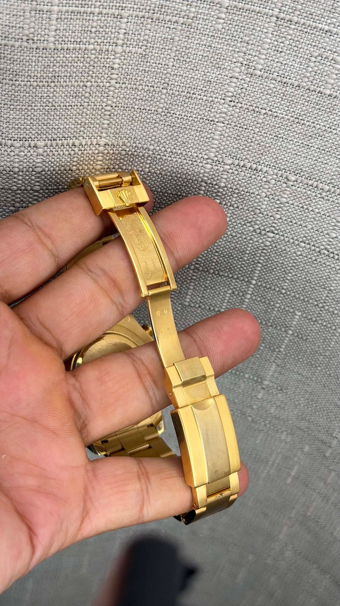 May be an image of jewelry and wrist watch