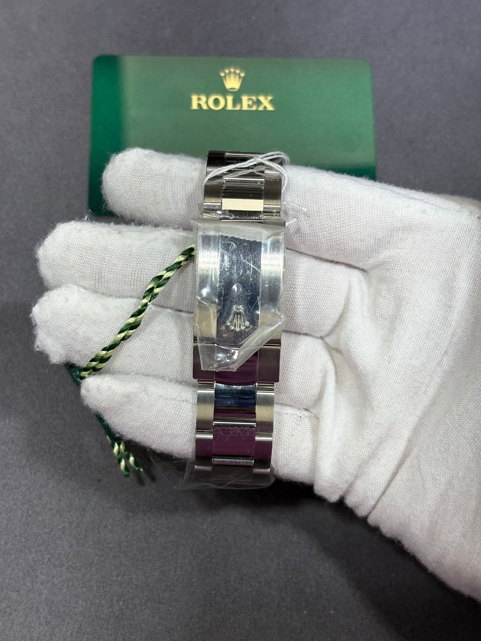 May be an image of wrist watch and text that says 'ROLEX'