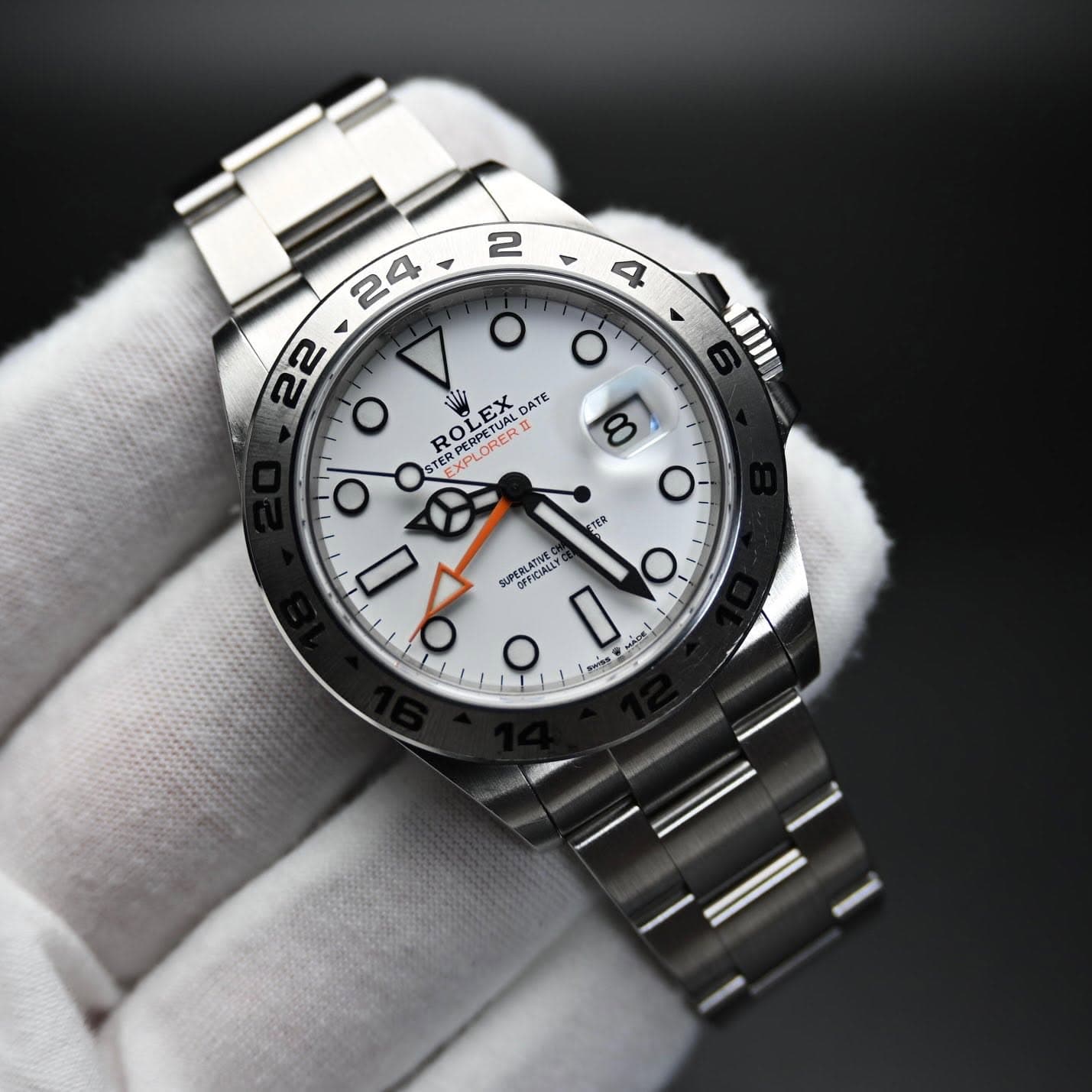 May be an image of wrist watch and text