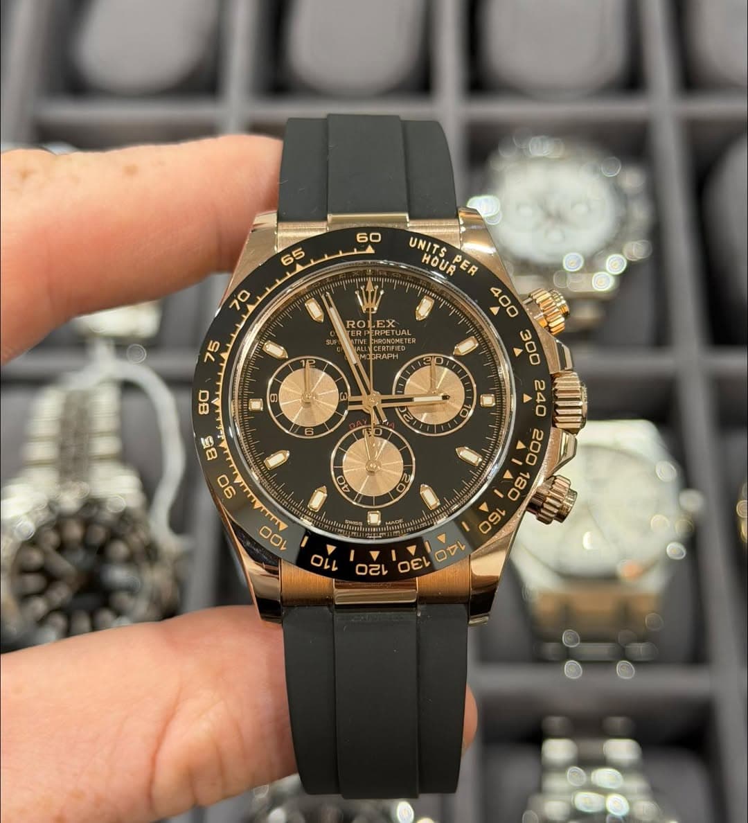 May be an image of wrist watch and text