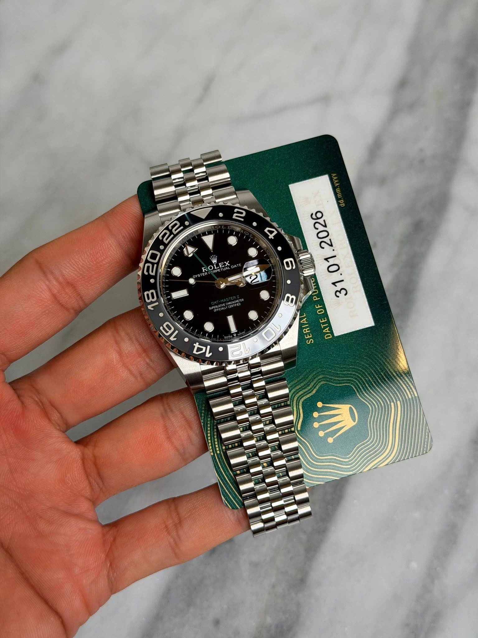 May be an image of wrist watch and text that says '₪ A LEN 2T カ OF SERIAL DATE DU NI'