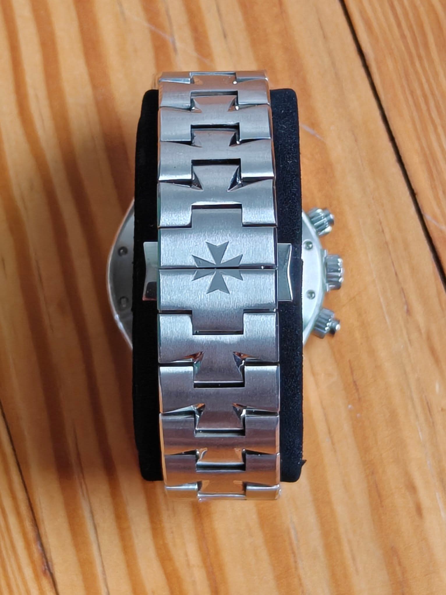 May be an image of leather, digital watch and text