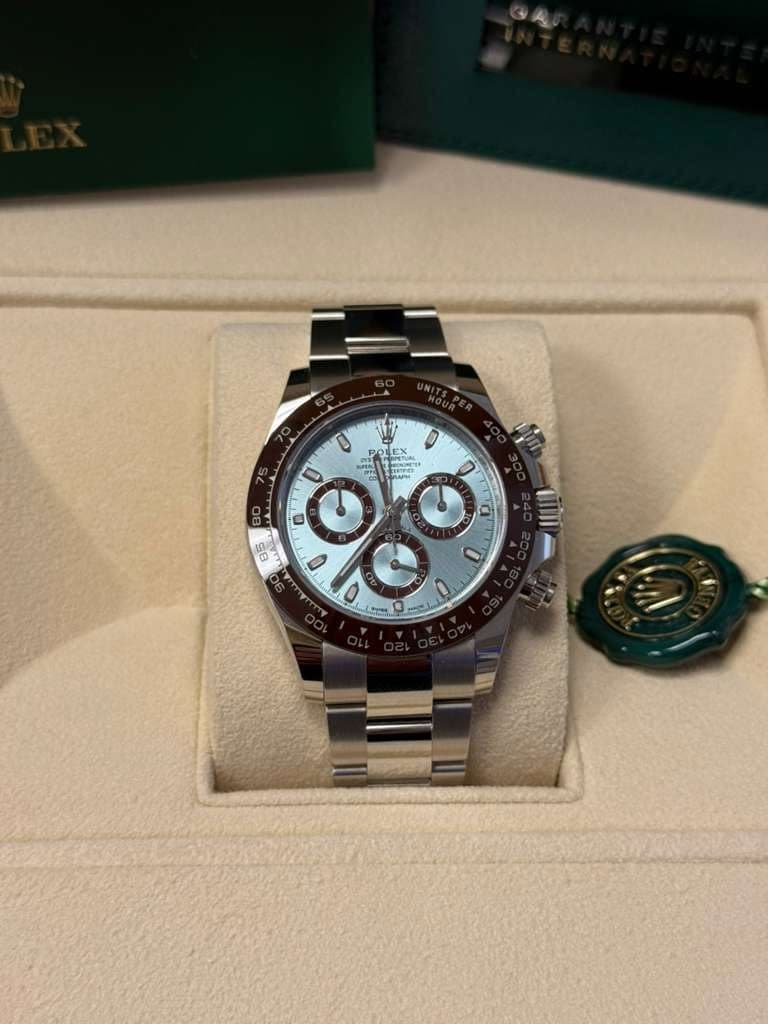 May be an image of wrist watch and text