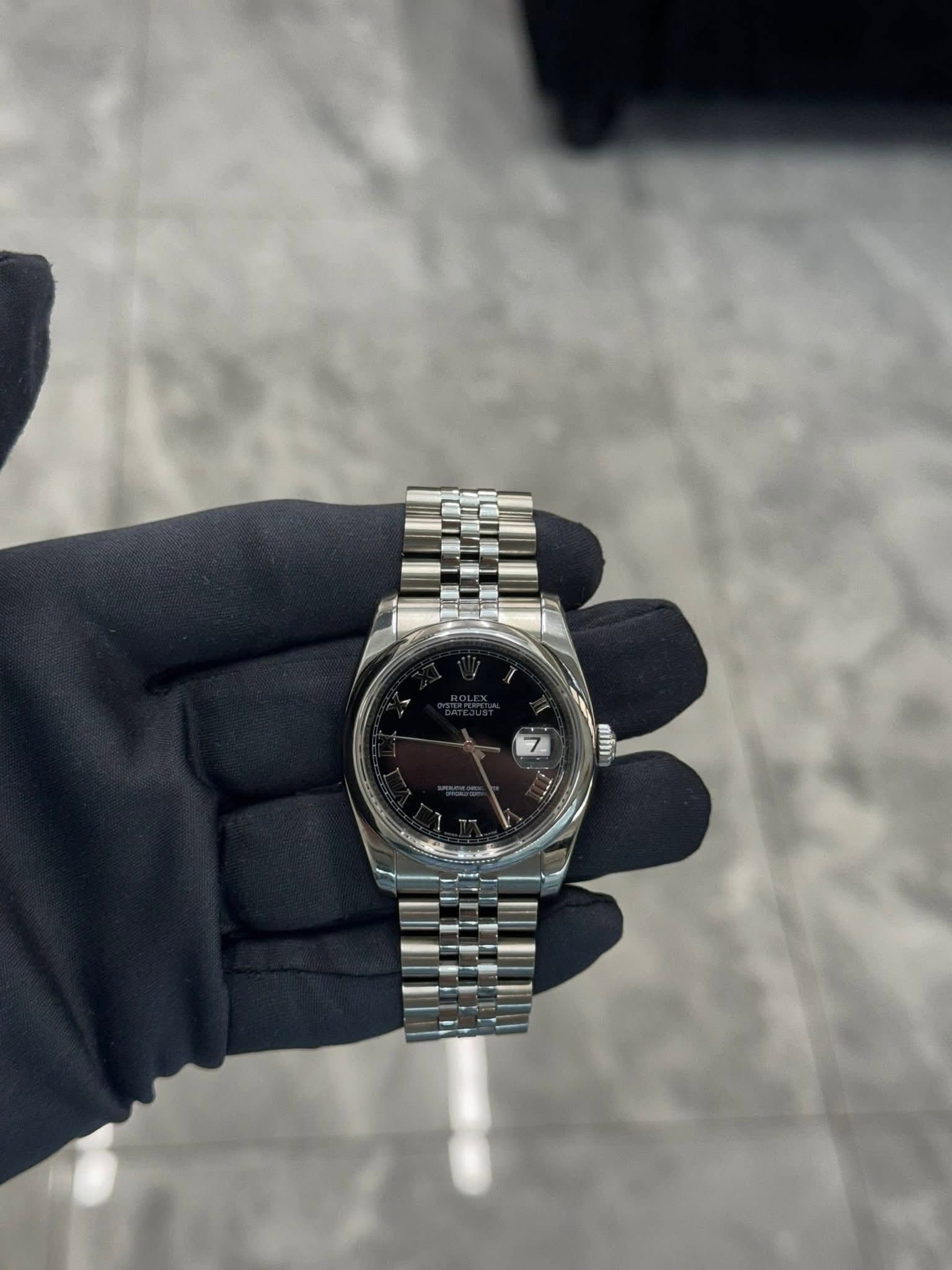 May be an image of wrist watch and text that says 'nimi'