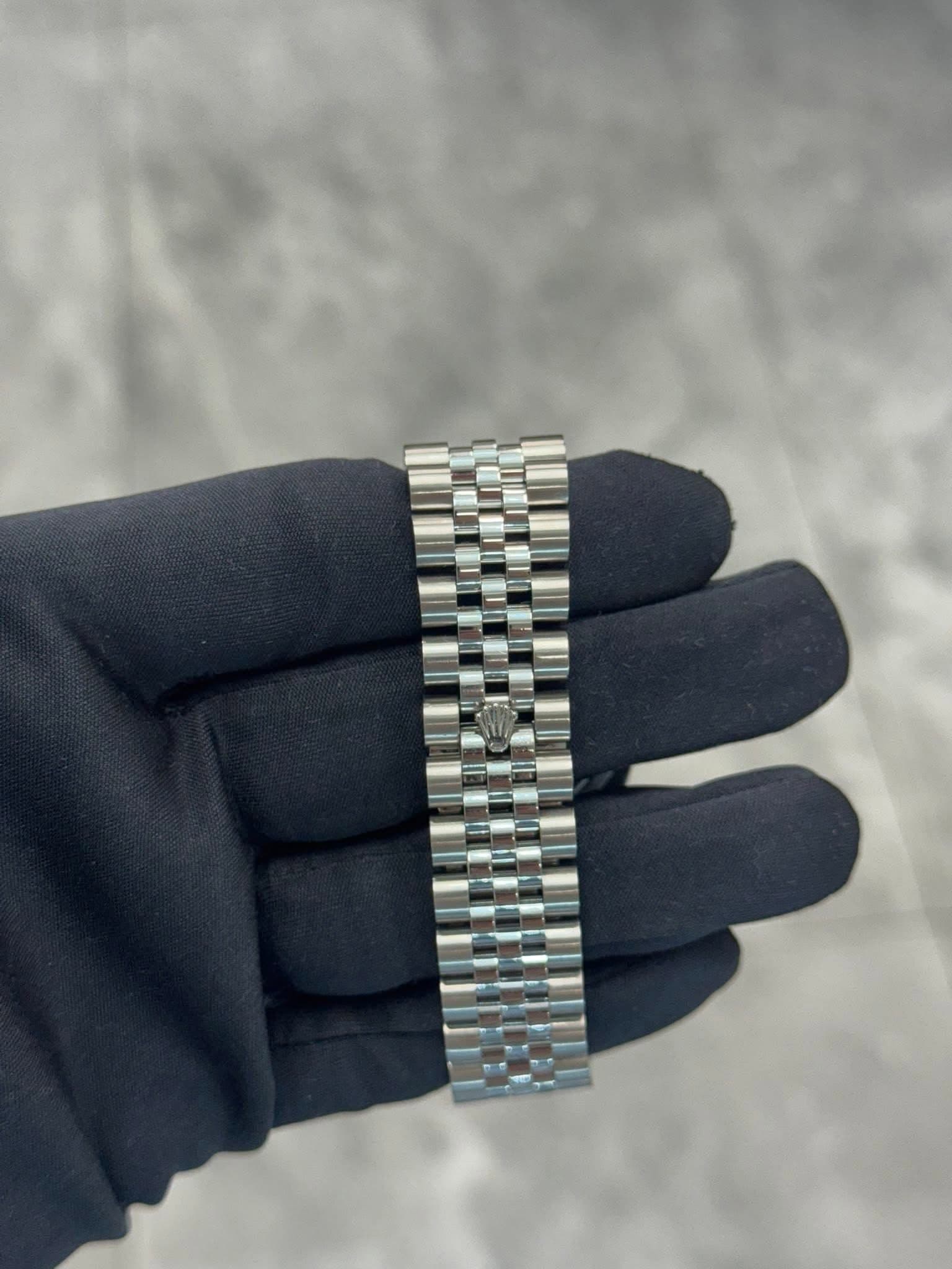 May be an image of wrist watch