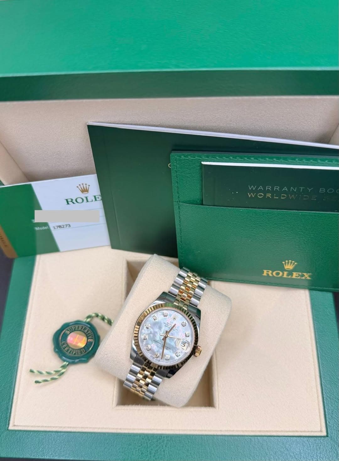 May be an image of wrist watch and text that says 'WW ROLE Model 178273 WARRA WORLD W ROLEX EX 11 2 4 വീා ကု 0 ชมง ERTIFTE 2 0 UN e ዮ'