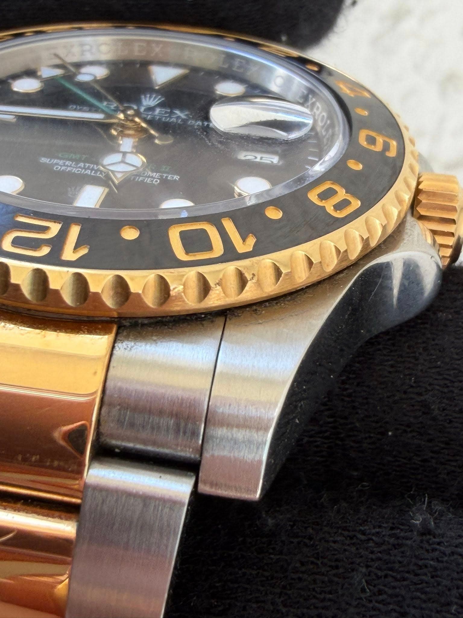 May be an image of wrist watch and text