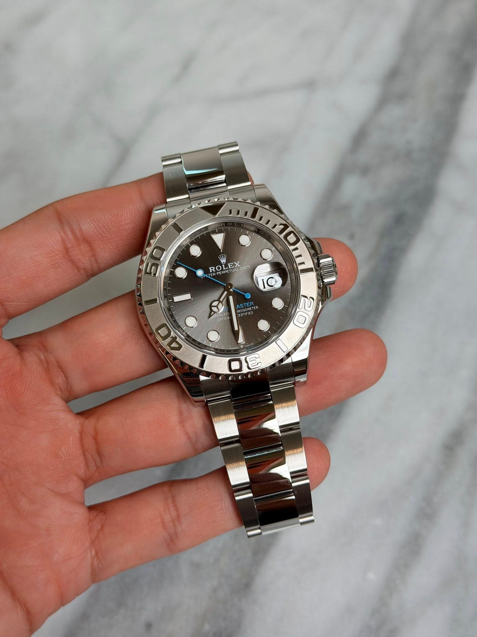 May be an image of wrist watch and text
