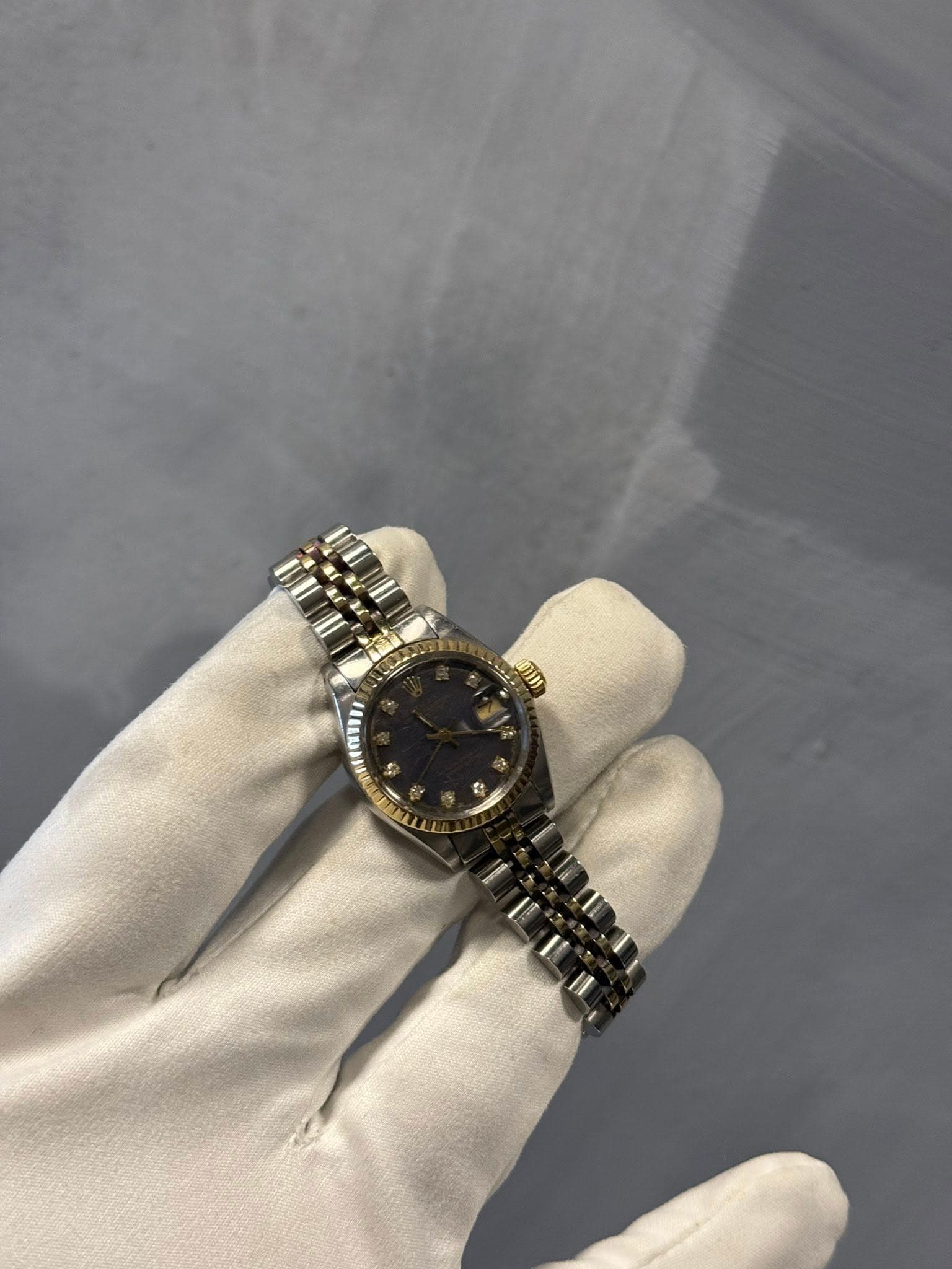 May be an image of wrist watch