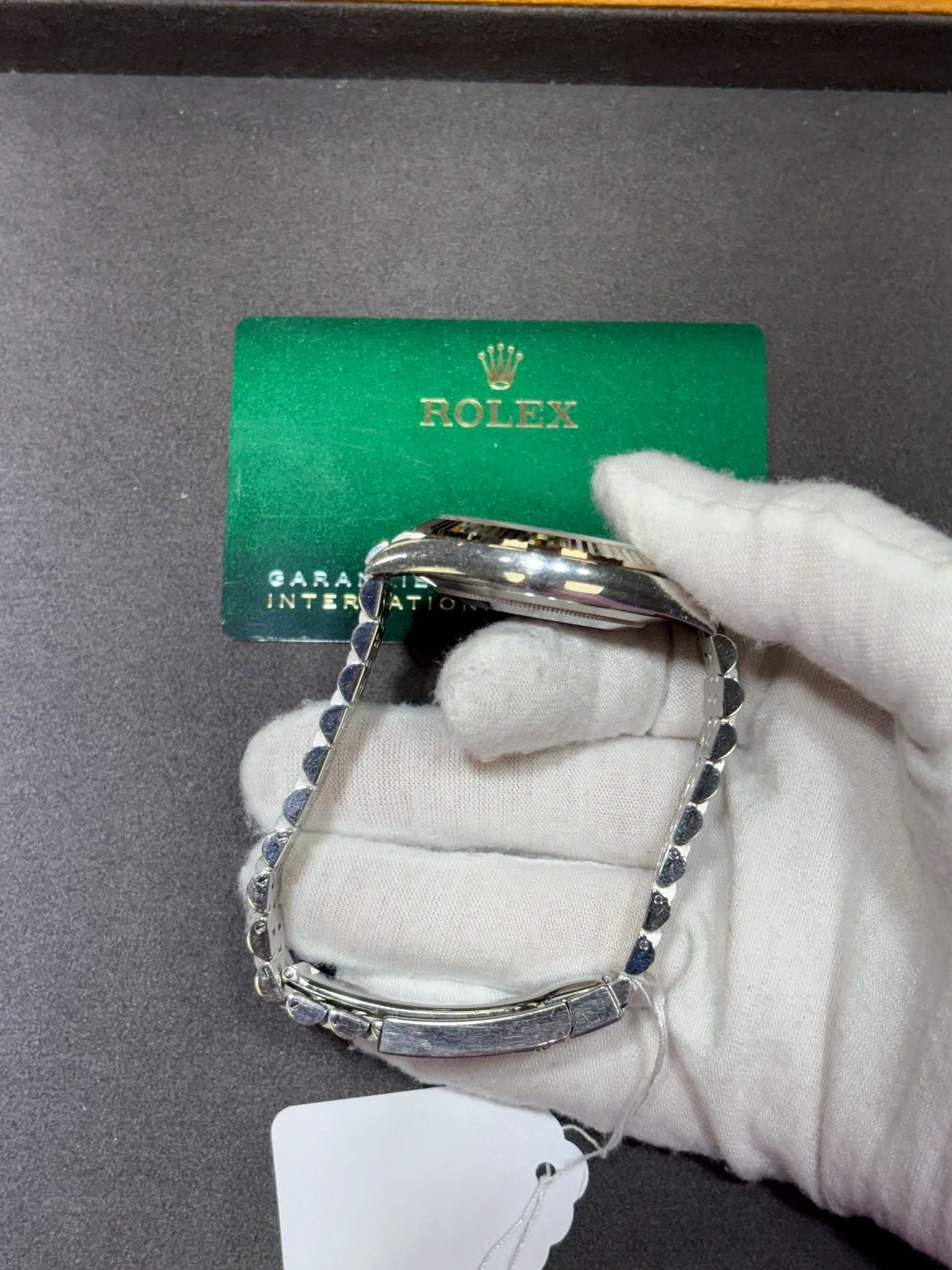 May be an image of jewelry and text that says 'ROLEX GARA INTER INT ុធភា'