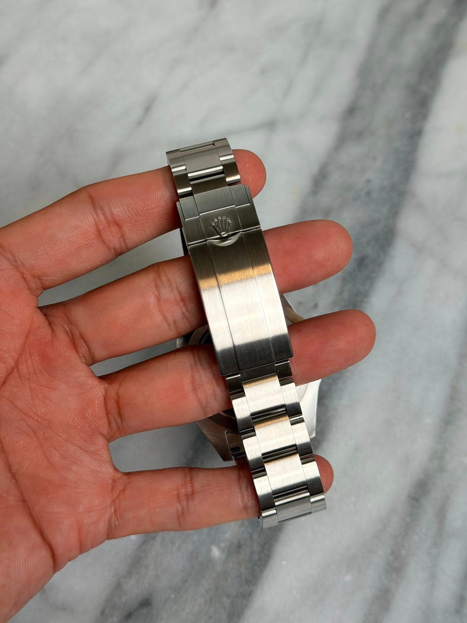 May be an image of wrist watch