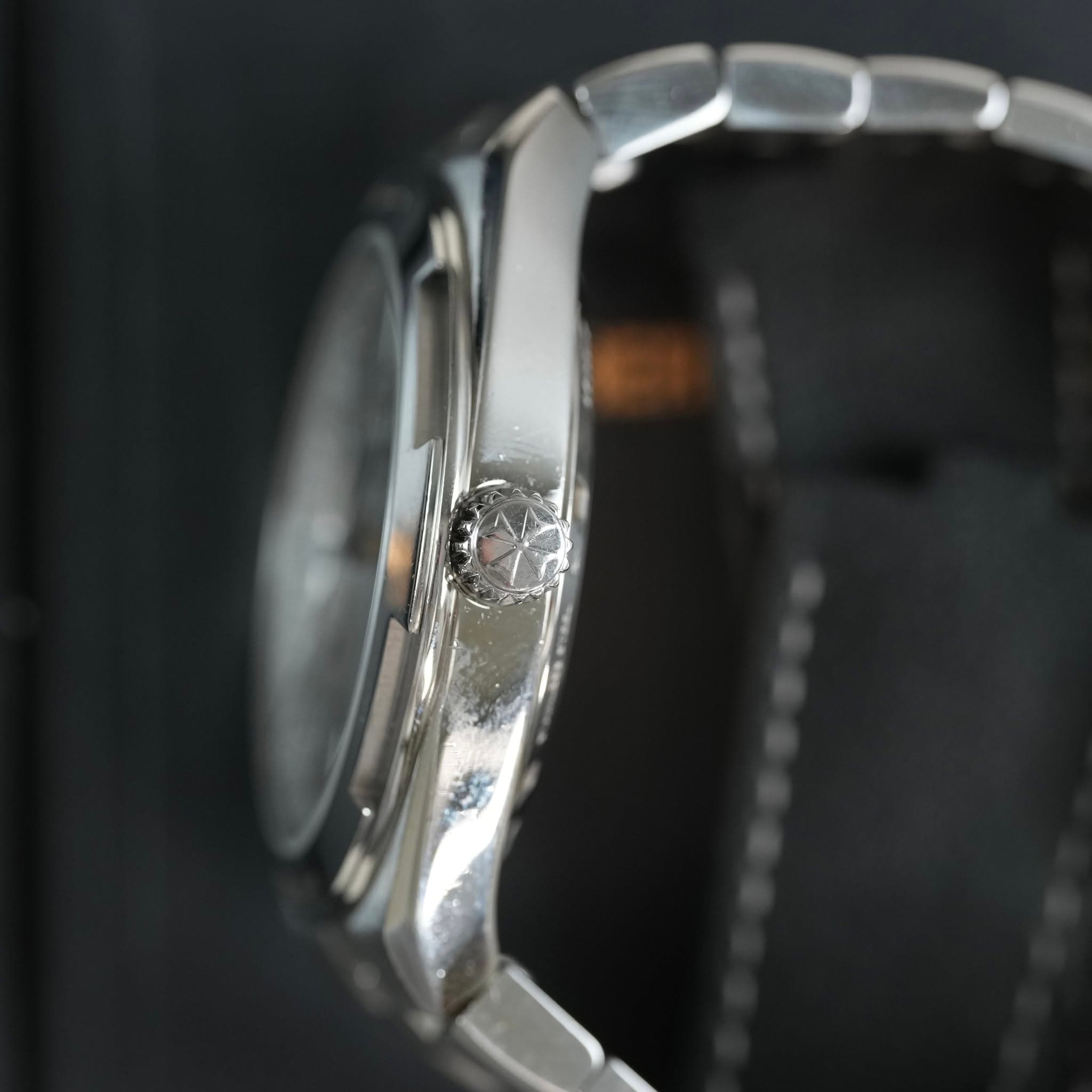 May be an image of wrist watch