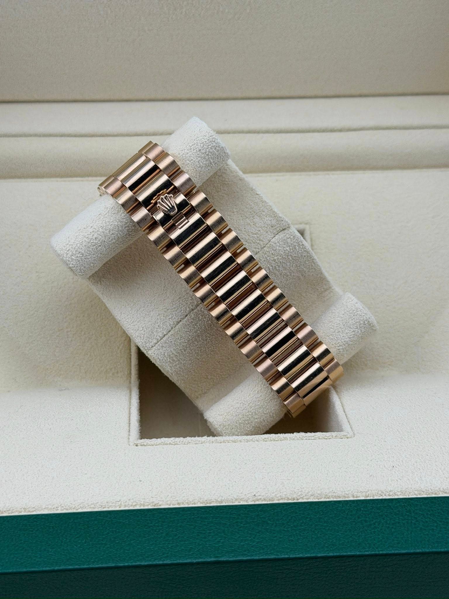 May be an image of wrist watch and jewelry
