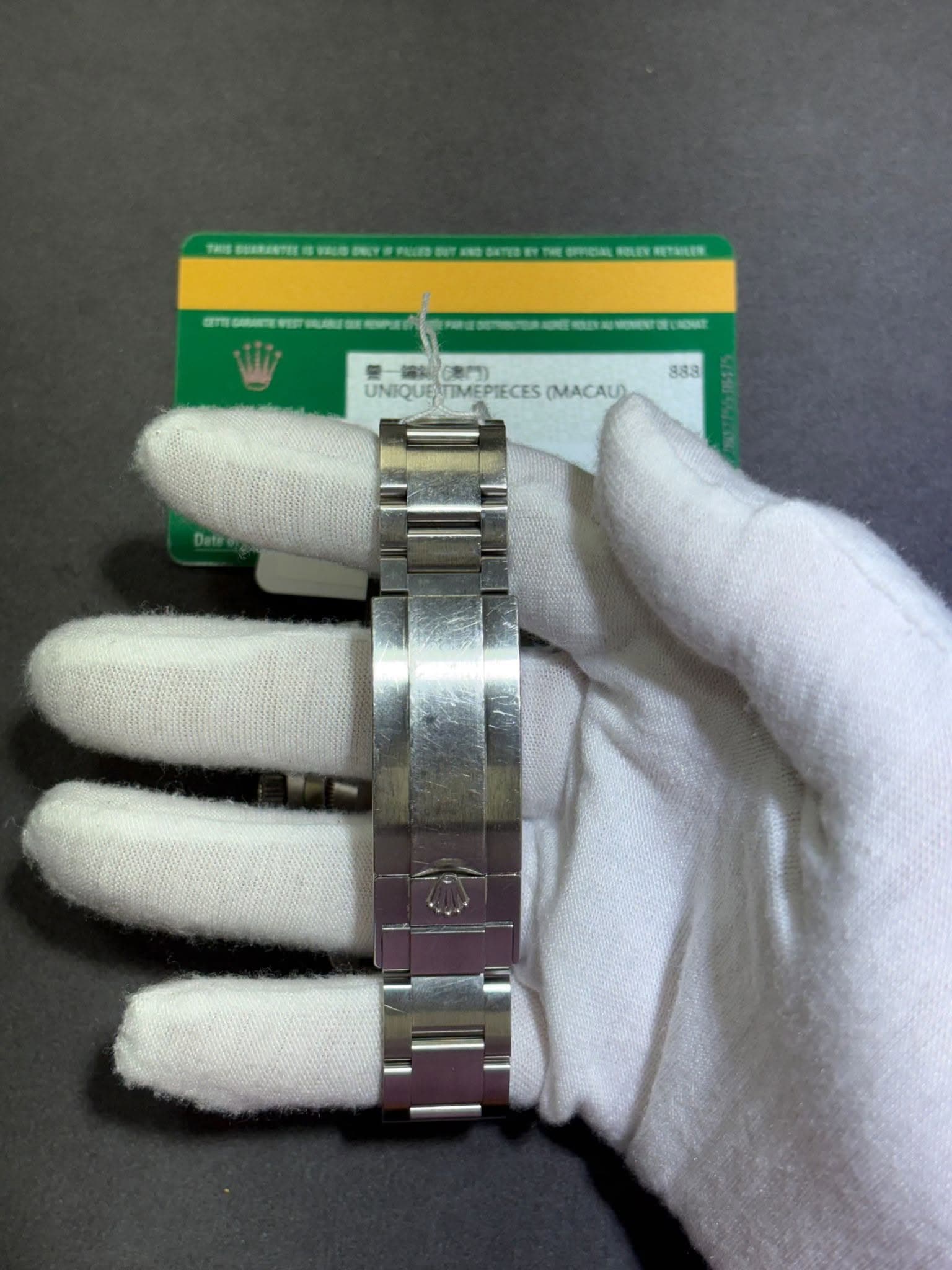 May be an image of wrist watch and text