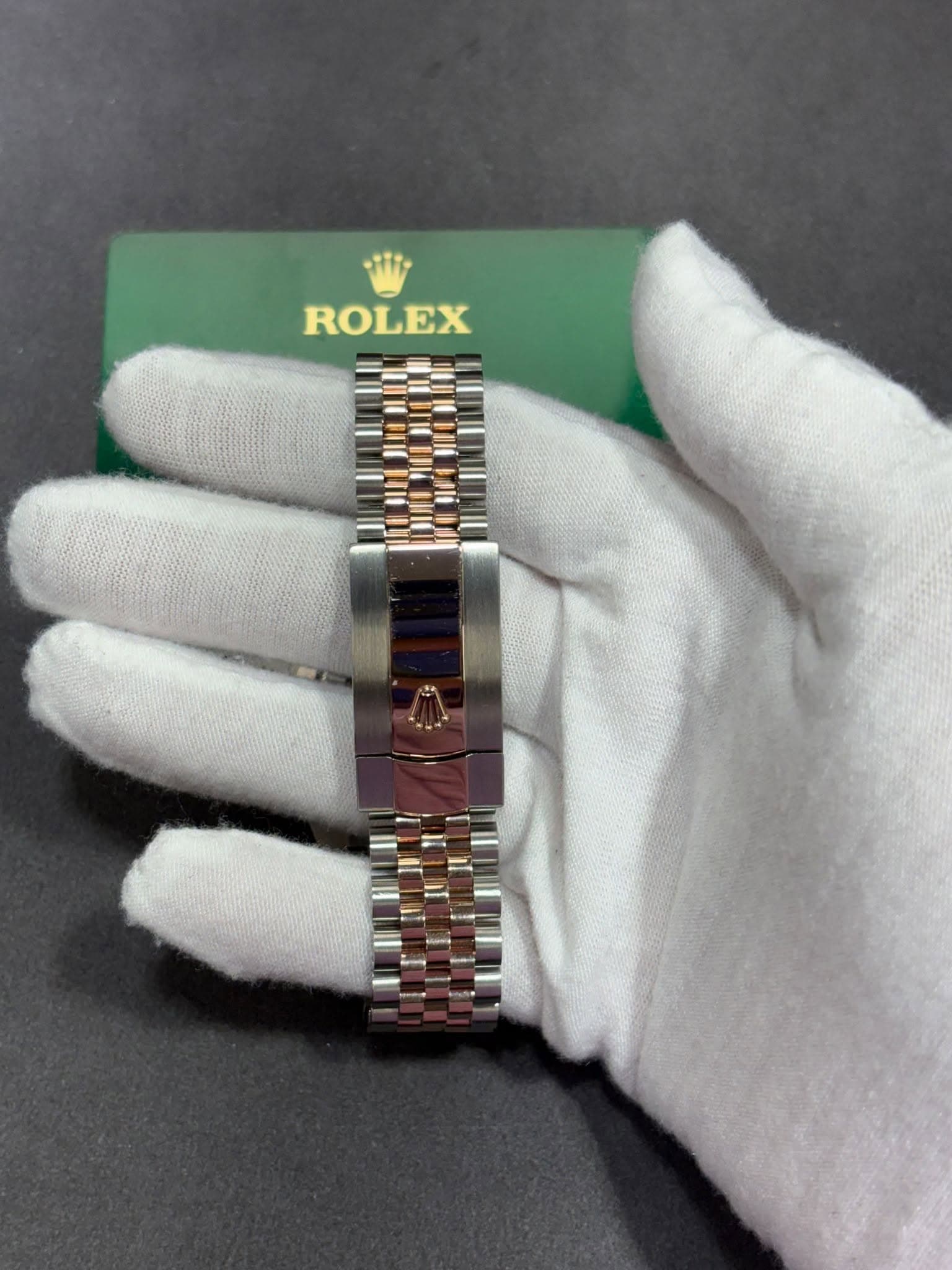 May be an image of wrist watch and text that says 'ROLEX S0'