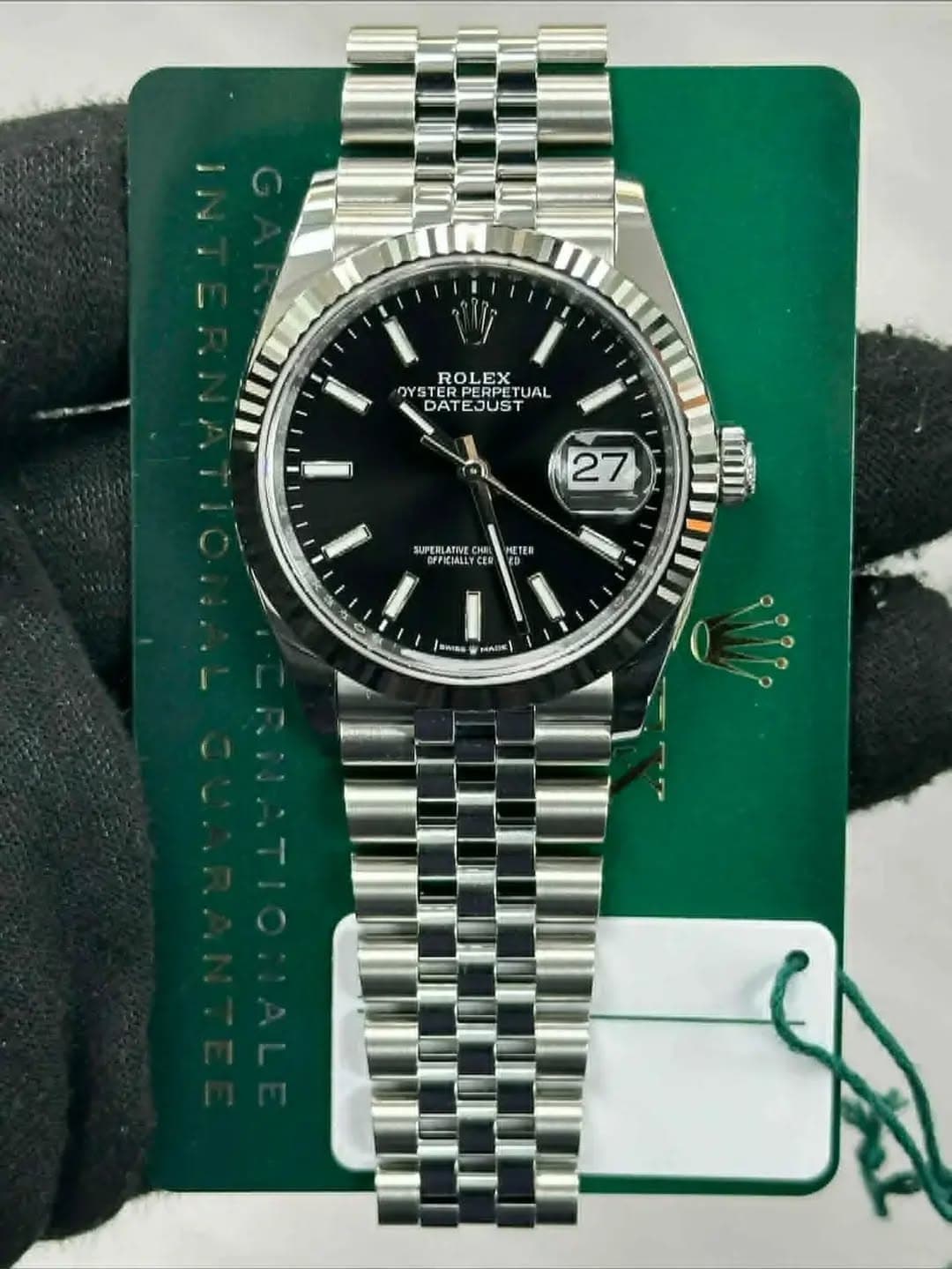 May be an image of wrist watch and text that says 'ROLEX OYST YSTER TERPE PERPE TUAL DAT TEJUST 27 SUPERLATINE OFFICIALLY CED 運生目 番w MADIE qllie o'