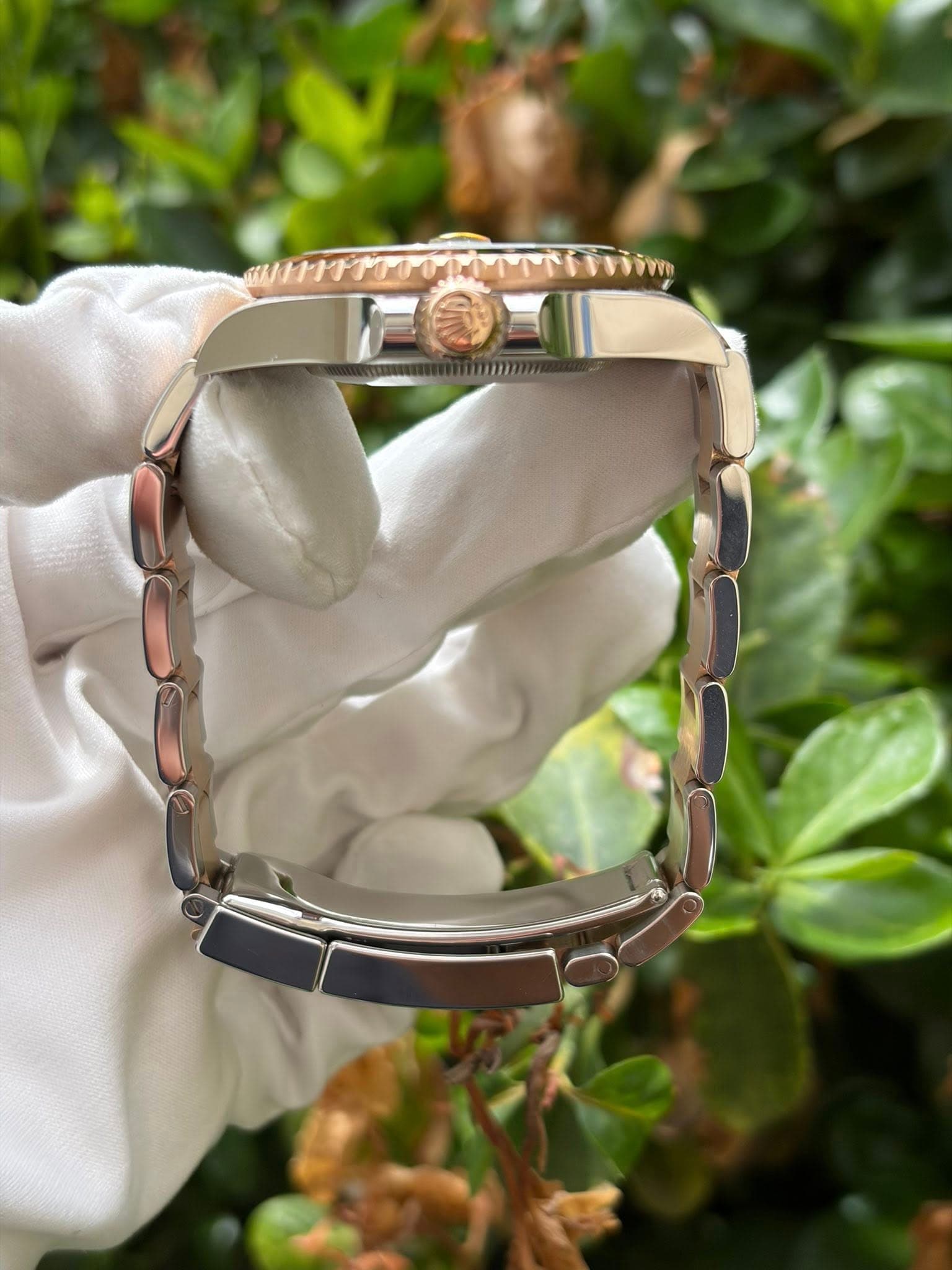May be an image of wrist watch and text