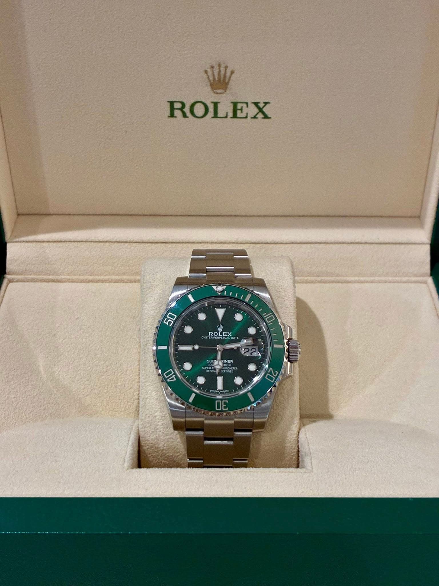 May be an image of wrist watch and text that says 'ROLEX CO 50 10 ROLEX ROLEX 40'